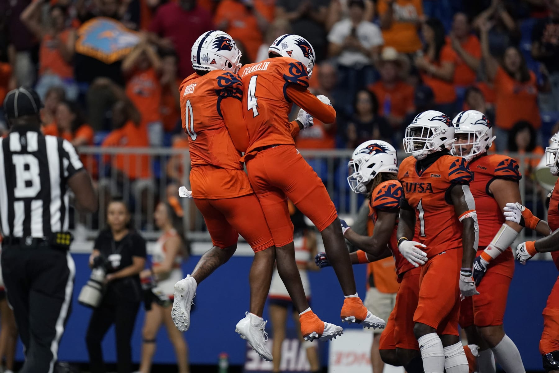 UTSA quarterback Frank Harris (0) and wide receiver Zakhari Franklin (4) celebrate after they connected on a touchdown pass against Texas Southern during the second half of an NCAA college football game, Saturday, Sept. 24, 2022, in San Antonio. (AP Photo/Eric Gay)