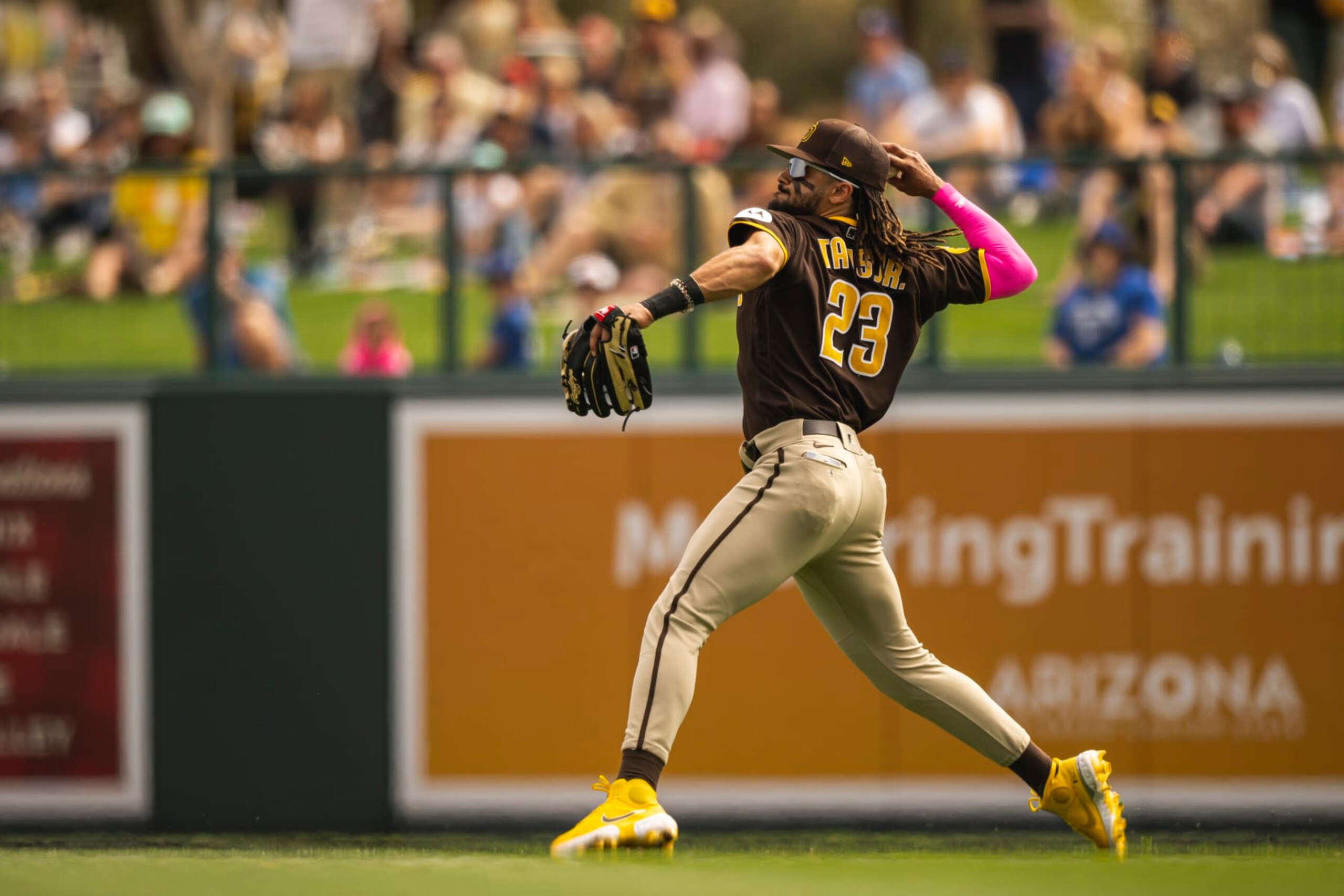 GLENDALE, AZ - MARCH 06: Fernando Tatis Jr. #23 of the San Diego Padres fields a ball hit to right field during a Spring Training game against the Los Angeles Dodgers on March 6, 2023 in Glendale, Arizona. (Photo by Matt Thomas/San Diego Padres/Getty Images)