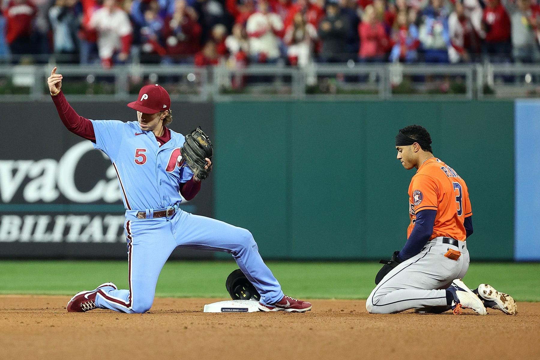 PHILADELPHIA, PENNSYLVANIA - NOVEMBER 03: Bryson Stott #5 of the Philadelphia Phillies forces out Jeremy Pena #3 of the Houston Astros during the first inning in Game Five of the 2022 World Series at Citizens Bank Park on November 03, 2022 in Philadelphia, Pennsylvania. (Photo by Tim Nwachukwu/Getty Images)
