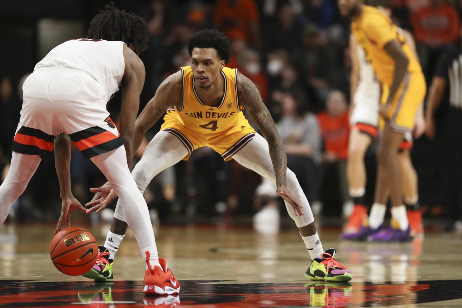 Arizona State guard Desmond Cambridge Jr. (4) guards Oregon State forward Glenn Taylor Jr. (35) during the second half of an NCAA college basketball game in Corvallis, Ore., Saturday, Jan. 14, 2023. Arizona State won 74-69. (AP Photo/Amanda Loman)
