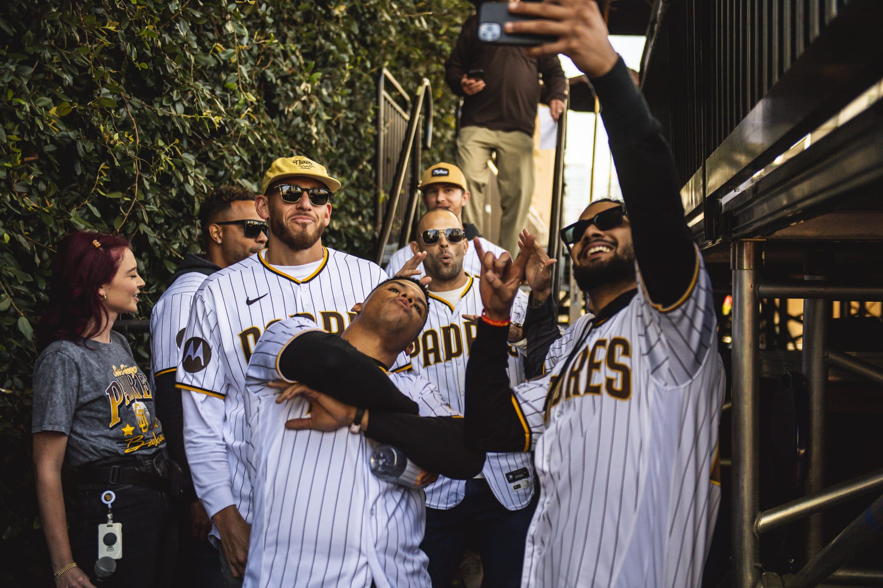 SAN DIEGO, CA - FEBRUARY 04: Fernando Tatis Jr #23, Juan Soto #22, Joe Musgrove #44 and Nick Martinez #21 of the San Diego Padres take a selfie during the San Diego Padres Fan Fest  at PETCO Park on February 4, 2023 in San Diego, California. (Photo by Matt Thomas/San Diego Padres/Getty Images)