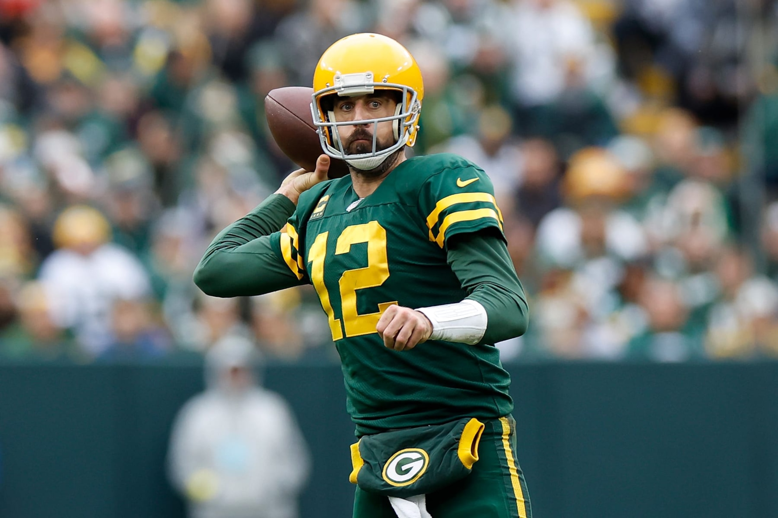 GREEN BAY, WISCONSIN - OCTOBER 16: Aaron Rodgers #12 of the Green Bay Packers throws a pass in the fourth quarter against the New York Jets at Lambeau Field on October 16, 2022 in Green Bay, Wisconsin. Jets defeated the Packers 27-10. (Photo by John Fisher/Getty Images)