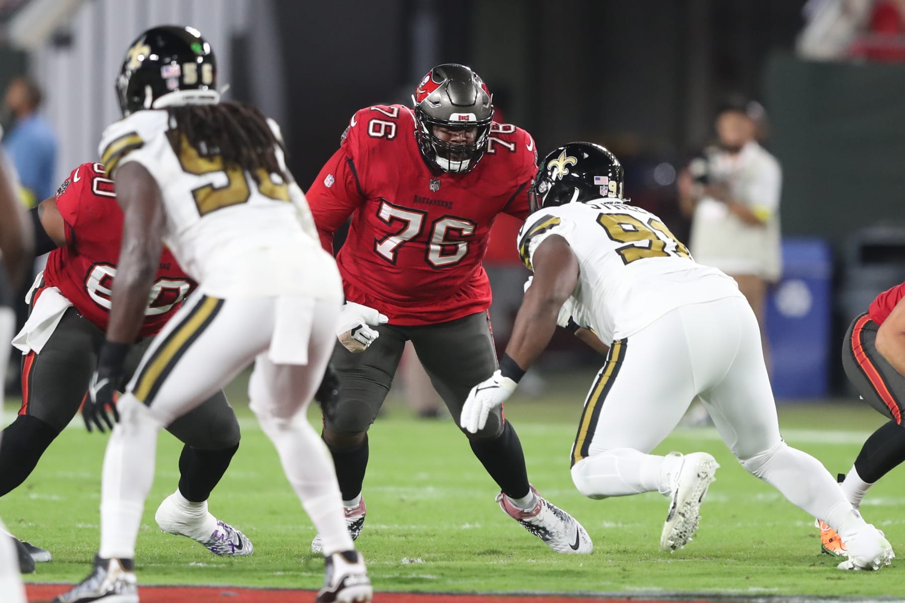 TAMPA, FL - DECEMBER 05: Tampa Bay Buccaneers Offensive Tackle Donovan Smith (76) pass blocks during the regular season game between the New Orleans Saints and the Tampa Bay Buccaneers on December 05, 2022 at Raymond James Stadium in Tampa, Florida. (Photo by Cliff Welch/Icon Sportswire via Getty Images)