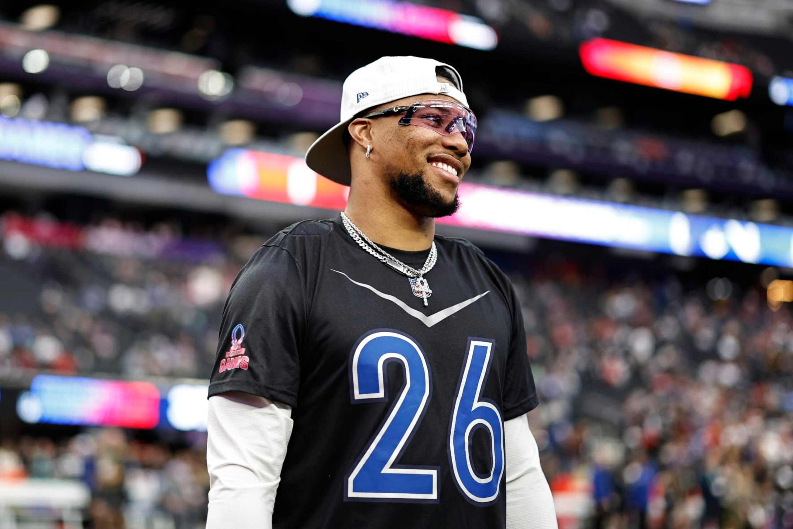 LAS VEGAS, NEVADA - FEBRUARY 05: LAS VEGAS, NEVADA - FEBRUARY 05: NFC running back Saquon Barkley #26 of the New York Giants reacts as he warms up prior to an NFL Pro Bowl football game at Allegiant Stadium on February 05, 2023 in Las Vegas, Nevada. (Photo by Michael Owens/Getty Images)