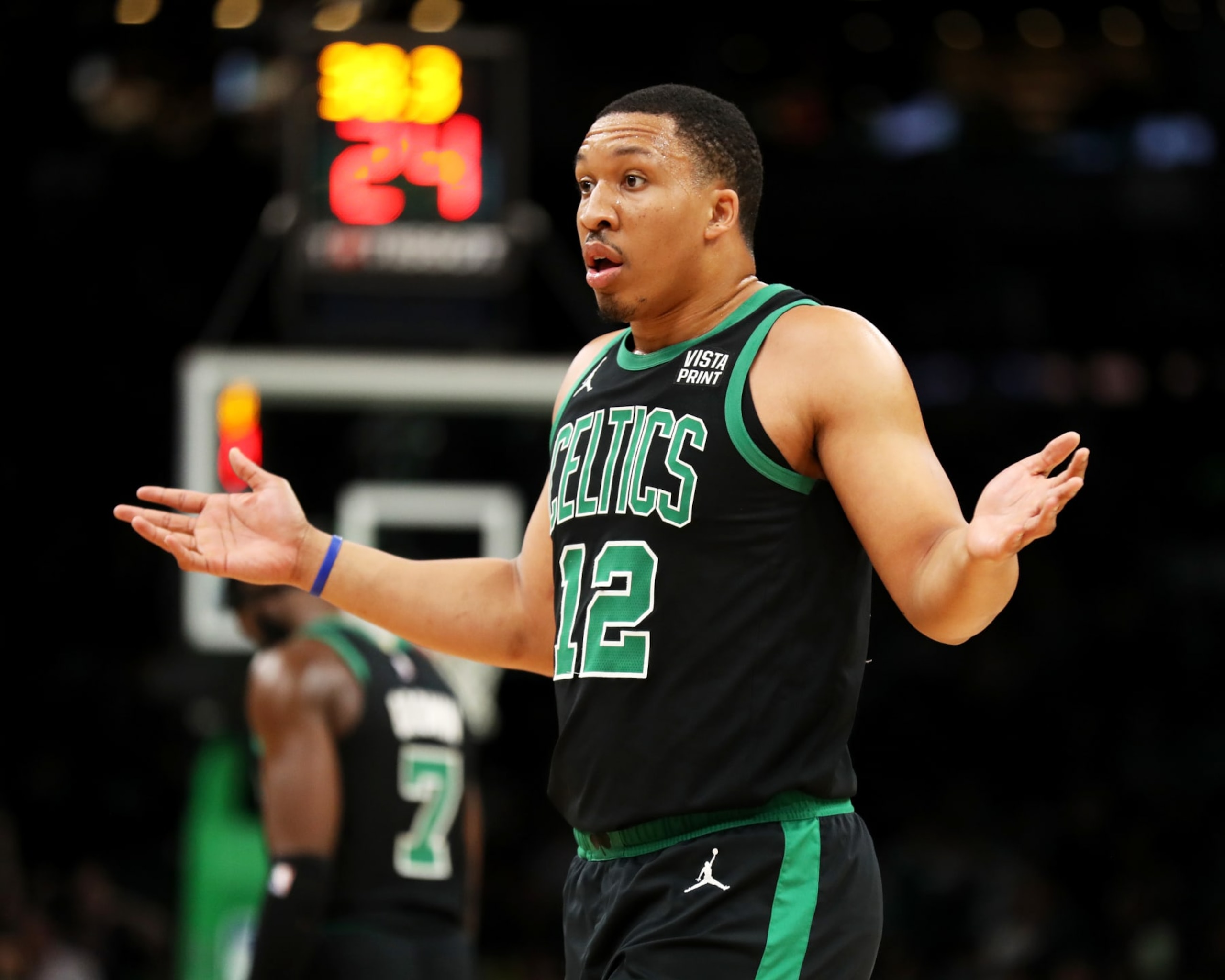 BOSTON, MASSACHUSETTS - MARCH 03: Grant Williams #12 of the Boston Celtics reacts during the fourth quarter of the game against the Brooklyn Nets at TD Garden on March 03, 2023 in Boston, Massachusetts. NOTE TO USER: User expressly acknowledges and agrees that, by downloading and or using this photograph, User is consenting to the terms and conditions of the Getty Images License Agreement. (Photo by Omar Rawlings/Getty Images)