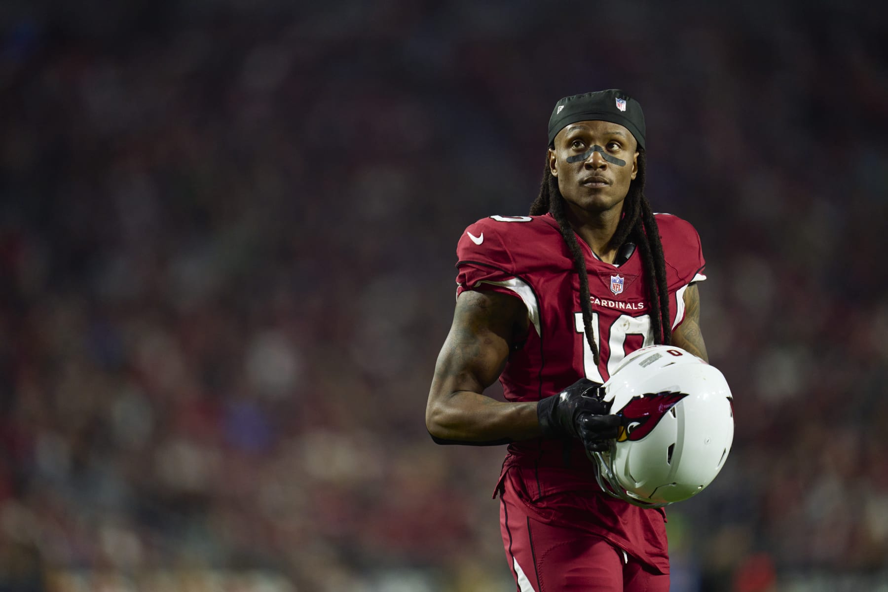 GLENDALE, AZ - DECEMBER 12: DeAndre Hopkins #10 of the Arizona Cardinals looks towards the sideline against the New England Patriots during the second half at State Farm Stadium on December 12, 2022 in Glendale, Arizona. (Photo by Cooper Neill/Getty Images)