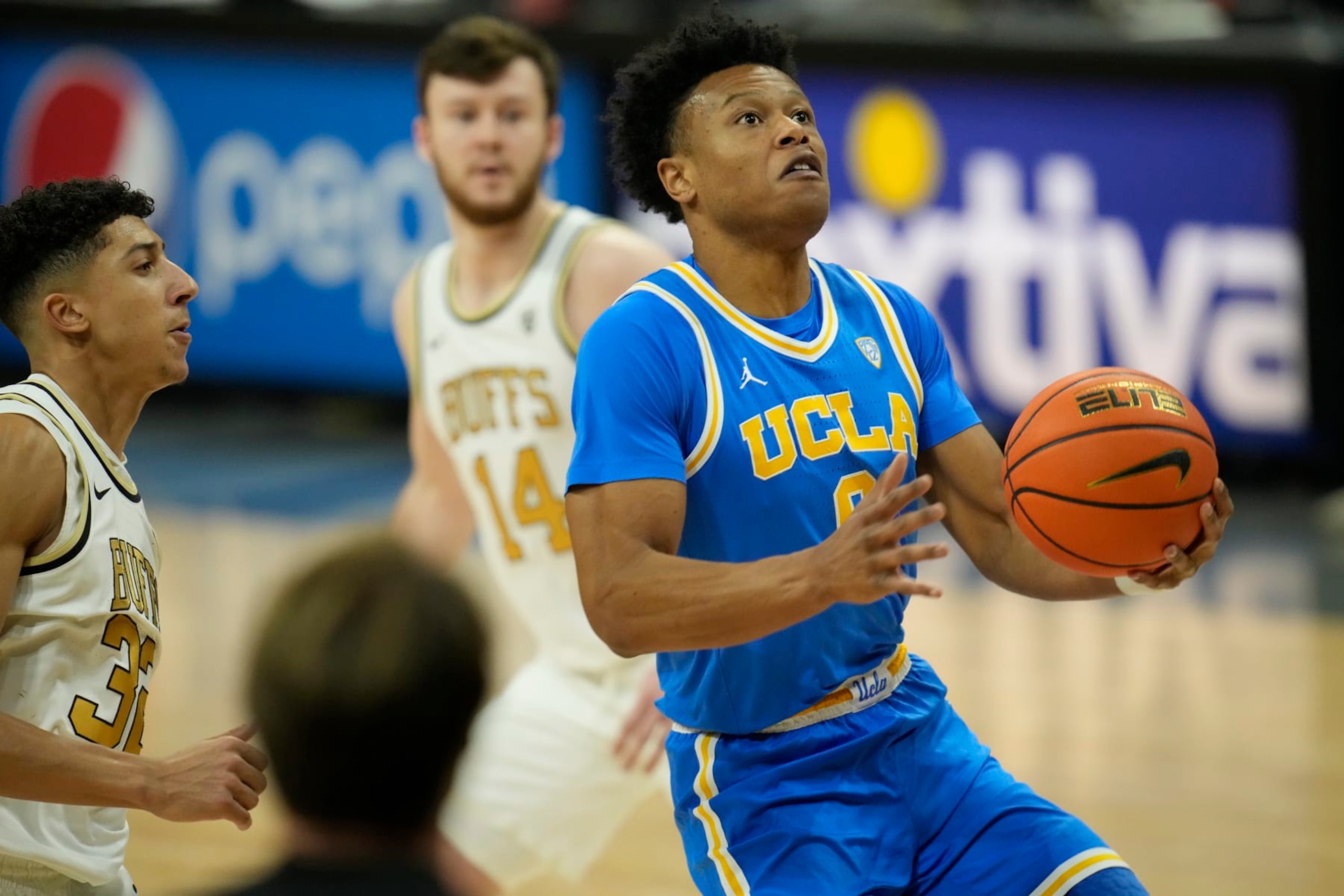 UCLA guard Jaylen Clark (0) in the first half of an NCAA college basketball game Sunday, Feb. 26, 2023, in Denver. (AP Photo/David Zalubowski) UCLA guard Jaylen Clark (0) in the first half of an NCAA college basketball game Sunday, Feb. 26, 2023, in Denver. (AP Photo/David Zalubowski)