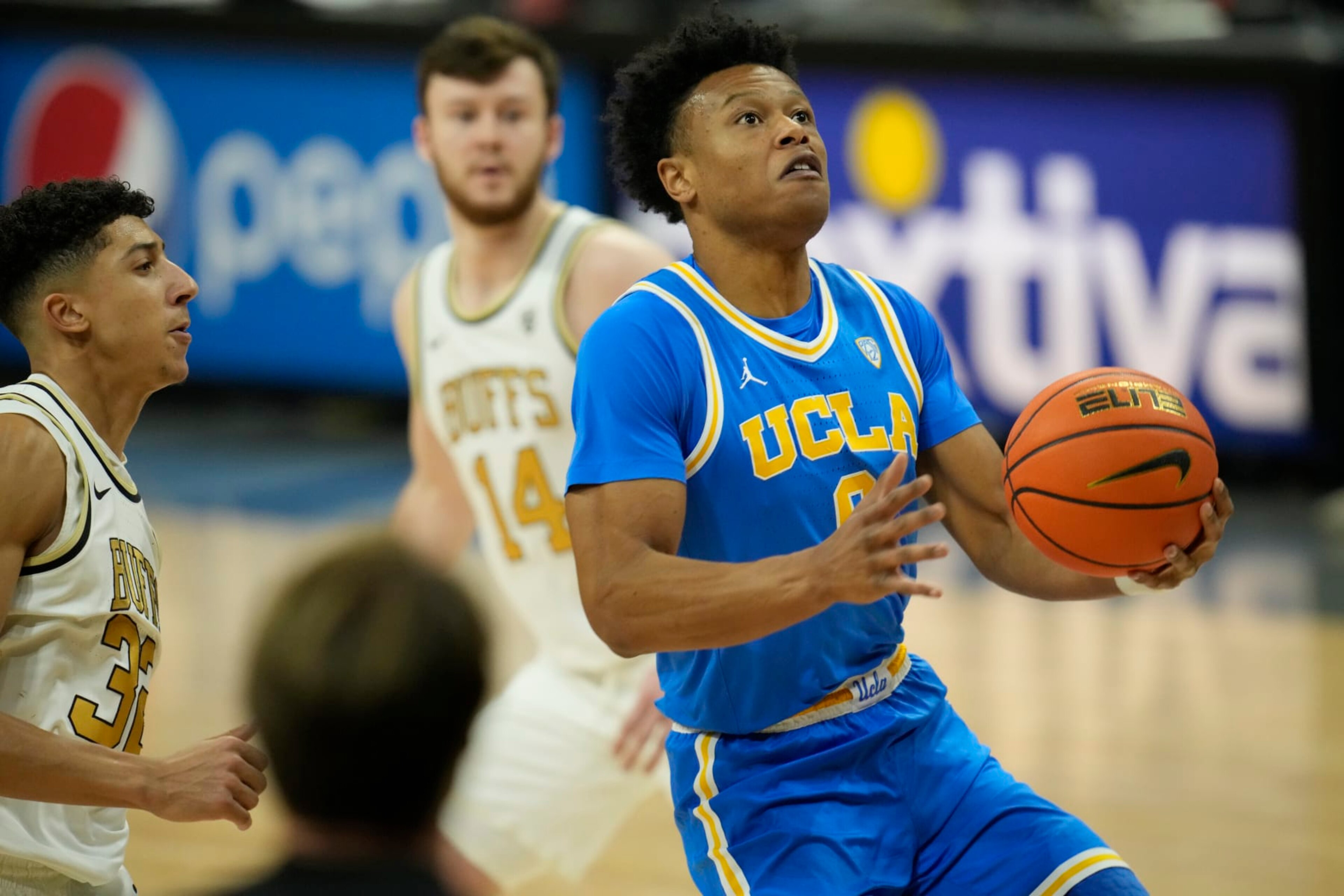 UCLA guard Jaylen Clark (0) in the first half of an NCAA college basketball game Sunday, Feb. 26, 2023, in Denver. (AP Photo/David Zalubowski)