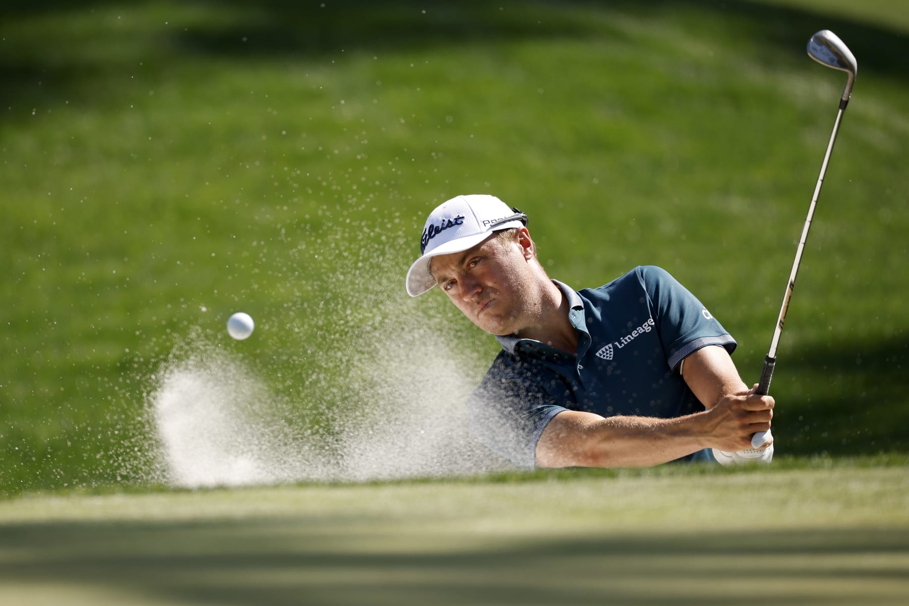 PONTE VEDRA BEACH, FLORIDA - MARCH 08: Justin Thomas of the United States plays a shot from a bunker on the sixth hole during a practice round prior to THE PLAYERS Championship on THE PLAYERS Stadium Course at TPC Sawgrass on March 08, 2023 in Ponte Vedra Beach, Florida. (Photo by Jared C. Tilton/Getty Images)