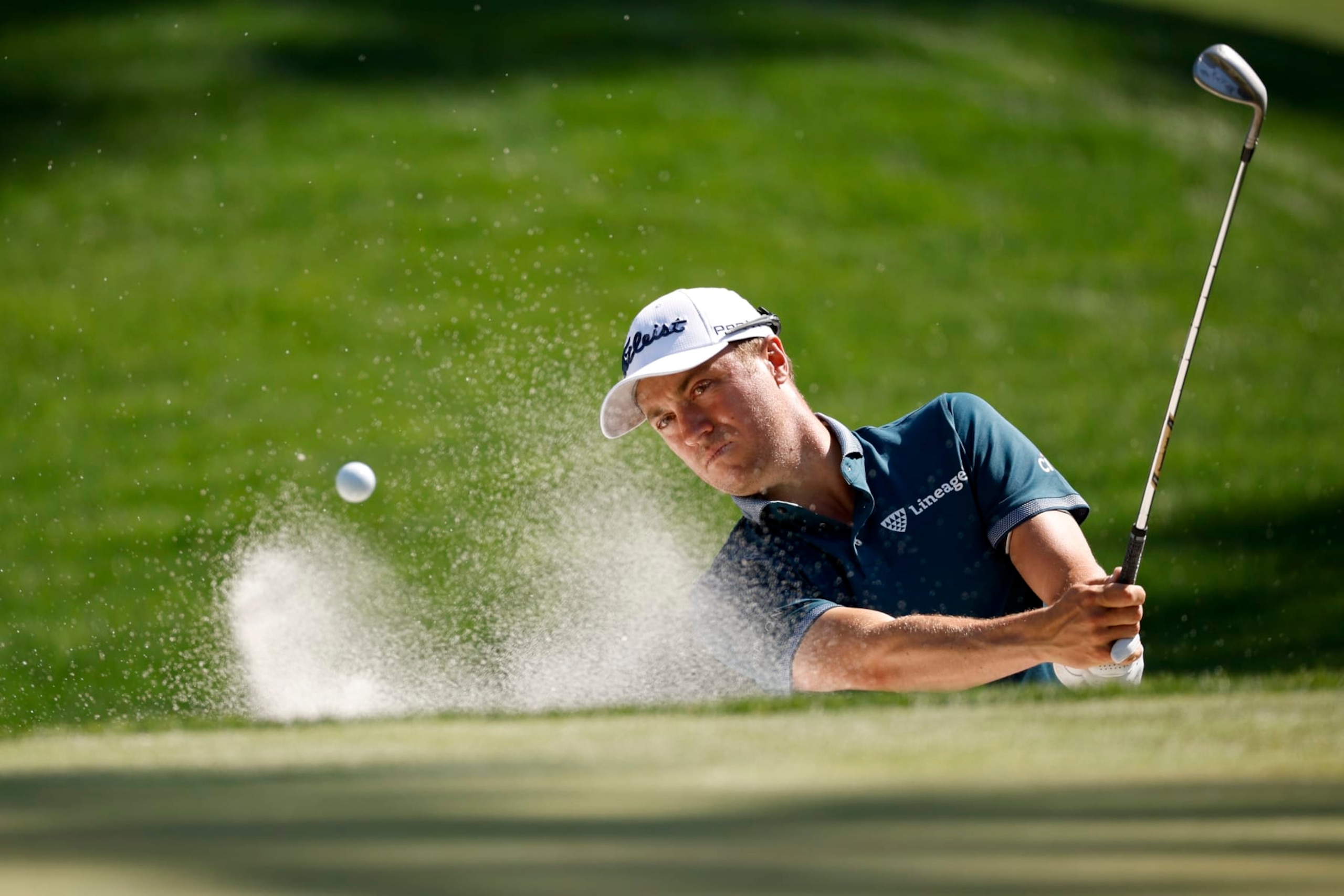 PONTE VEDRA BEACH, FLORIDA - MARCH 08: Justin Thomas of the United States plays a shot from a bunker on the sixth hole during a practice round prior to THE PLAYERS Championship on THE PLAYERS Stadium Course at TPC Sawgrass on March 08, 2023 in Ponte Vedra Beach, Florida. (Photo by Jared C. Tilton/Getty Images)