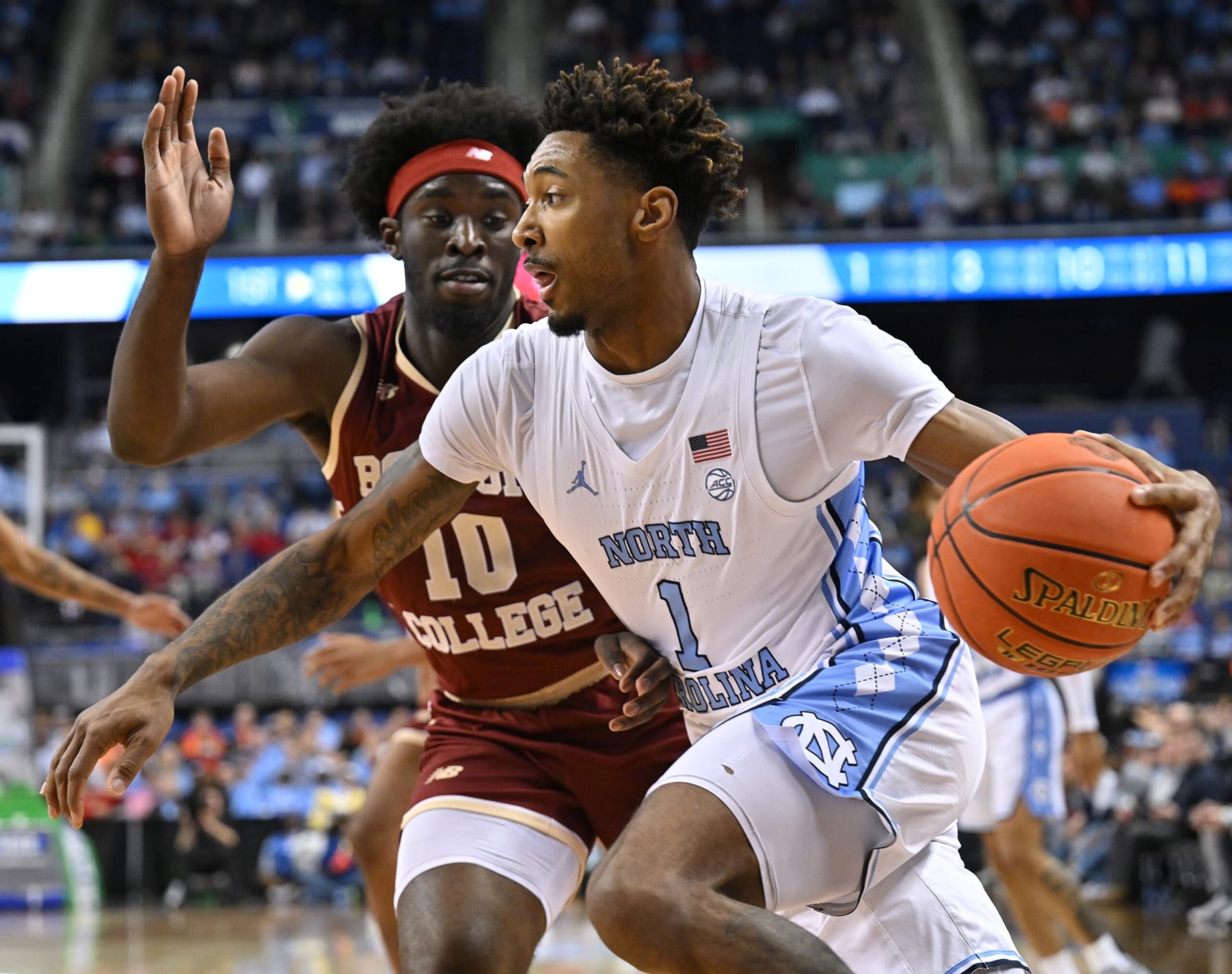 GREENSBORO, NORTH CAROLINA - MARCH 08: Leaky Black #1 of the North Carolina Tar Heels dribbles the ball against Prince Aligbe #10 of the Boston College Eagles during the first half of their game in the second round of the ACC Basketball Tournament at Greensboro Coliseum on March 08, 2023 in Greensboro, North Carolina. (Photo by Grant Halverson/Getty Images) GREENSBORO, NORTH CAROLINA - MARCH 08: Leaky Black #1 of the North Carolina Tar Heels dribbles the ball against Prince Aligbe #10 of the Boston College Eagles during the first half of their game in the second round of the ACC Basketball Tournament at Greensboro Coliseum on March 08, 2023 in Greensboro, North Carolina. (Photo by Grant Halverson/Getty Images)
