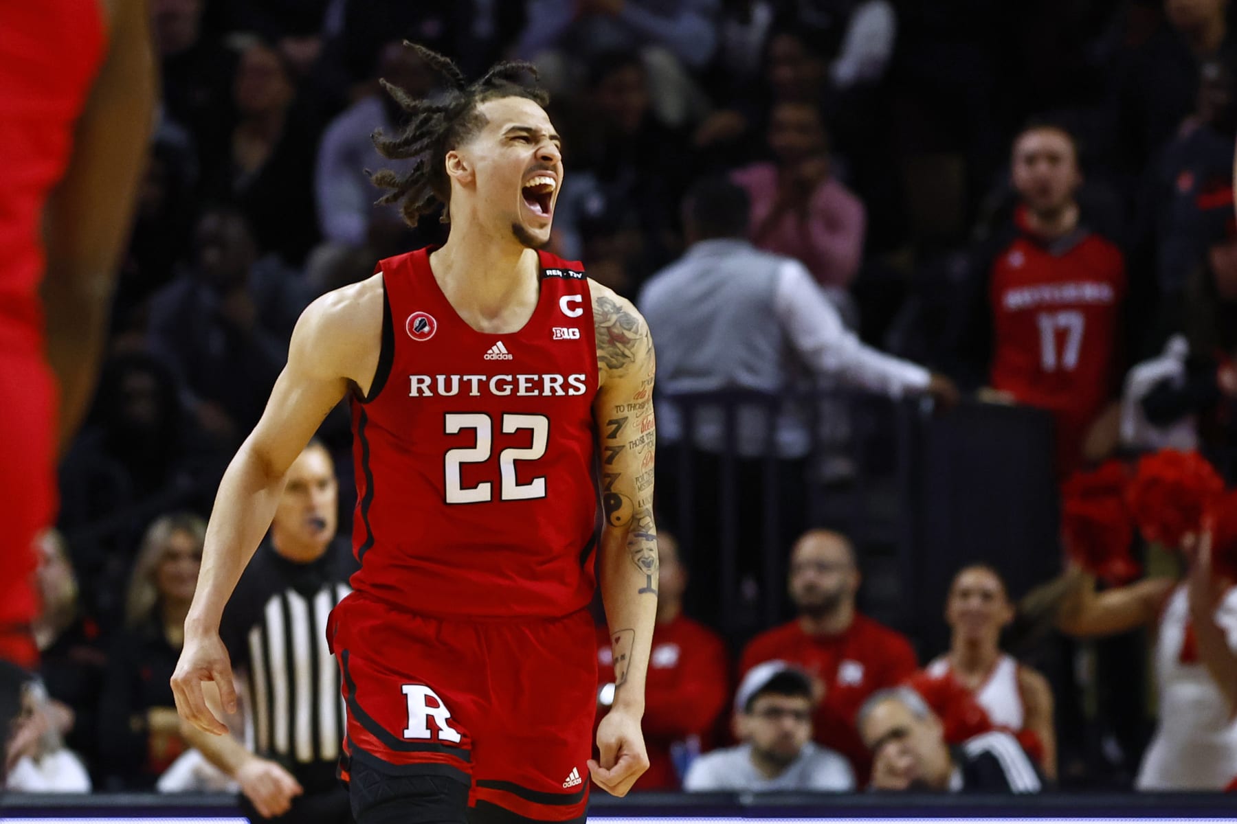 PISCATAWAY, NJ - MARCH 05: Caleb McConnell #22 of the Rutgers Scarlet Knights reacts to a basket against the Northwestern Wildcats during the first half of a game at Jersey Mike's Arena on March 5, 2023 in Piscataway, New Jersey. (Photo by Rich Schultz/Getty Images)