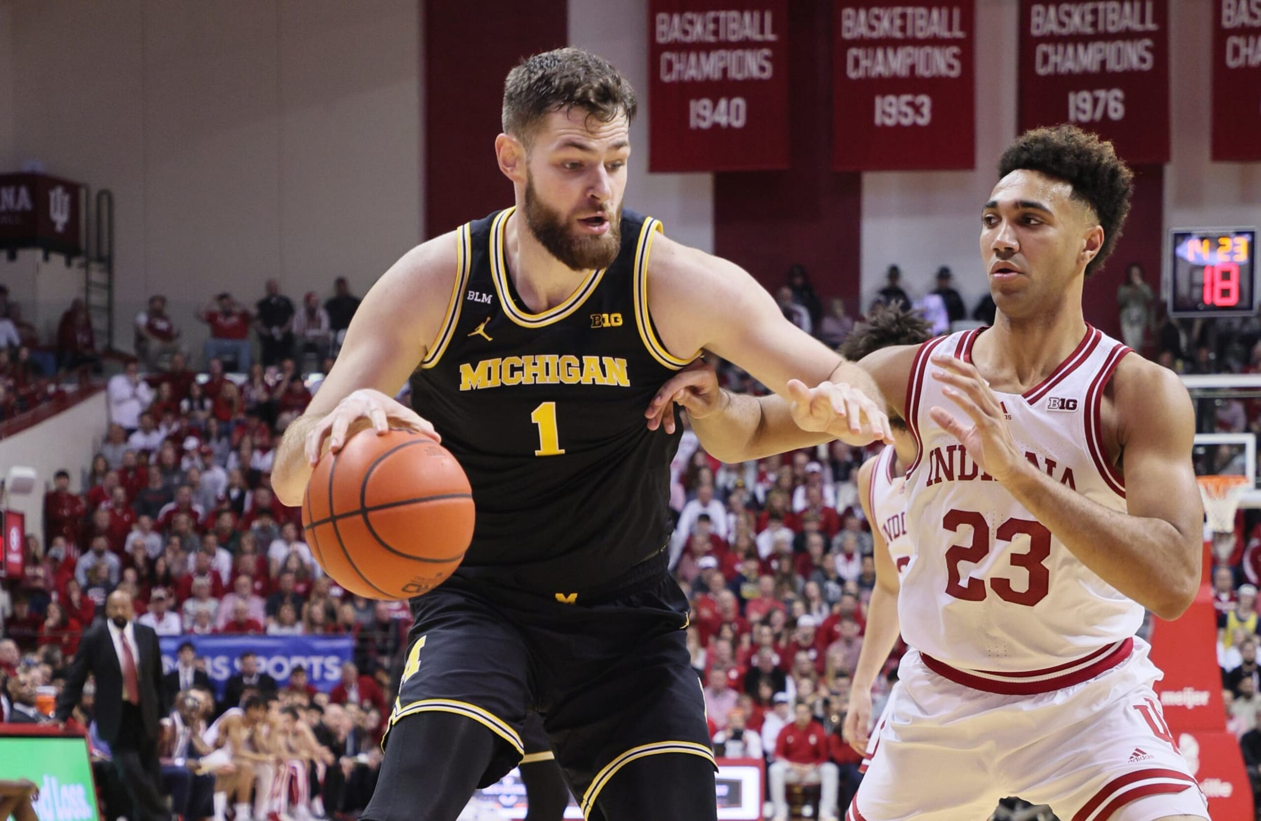BLOOMINGTON, INDIANA - MARCH 05:  Hunter Dickinson #1 of the Michigan Wolverines in the 75-73 OT loss to the Indiana Hoosiers  at Simon Skjodt Assembly Hall on March 05, 2023 in Bloomington, Indiana. (Photo by Andy Lyons/Getty Images)