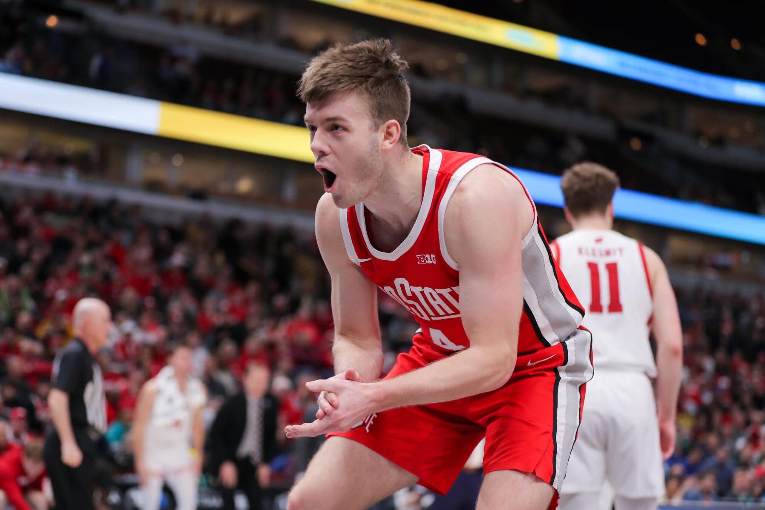 CHICAGO, IL - MARCH 08: Ohio State Buckeyes guard Sean McNeil (4) reacts after a play during the mens Big Ten Tournament basketball game between the Ohio State Buckeyes and the Wisconsin Badgers on March 08, 2023, at the United Center in Chicago, IL. (Photo by Melissa Tamez/Icon Sportswire via Getty Images)