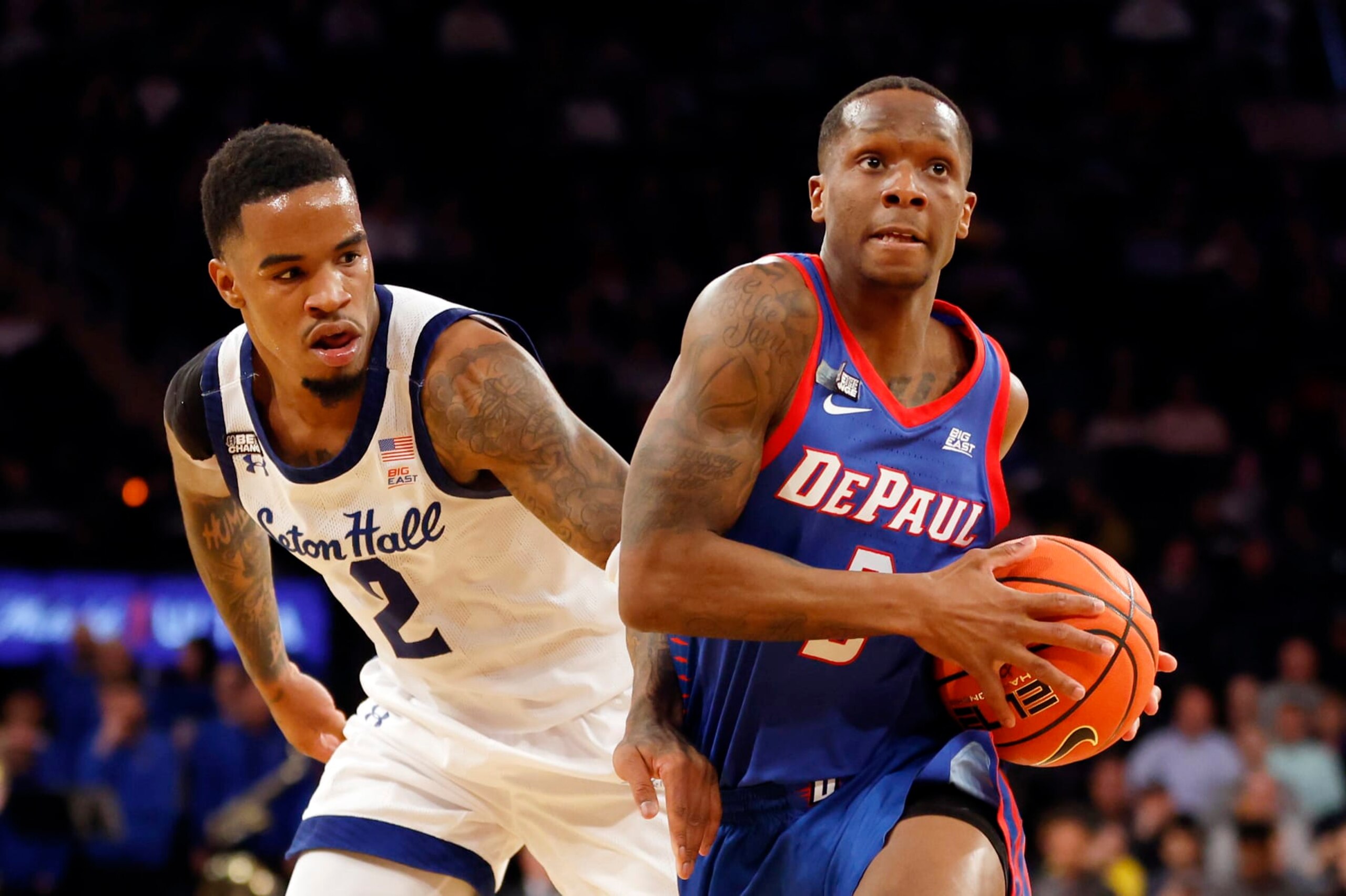 NEW YORK, NEW YORK - MARCH 08: Umoja Gibson #2 of the DePaul Blue Demons dribbles as Al-Amir Dawes #2 of the Seton Hall Pirates defends during the first half in the first round of the Big East Basketball Tournament at Madison Square Garden on March 08, 2023 in New York City. (Photo by Sarah Stier/Getty Images) NEW YORK, NEW YORK - MARCH 08: Umoja Gibson #2 of the DePaul Blue Demons dribbles as Al-Amir Dawes #2 of the Seton Hall Pirates defends during the first half in the first round of the Big East Basketball Tournament at Madison Square Garden on March 08, 2023 in New York City. (Photo by Sarah Stier/Getty Images)