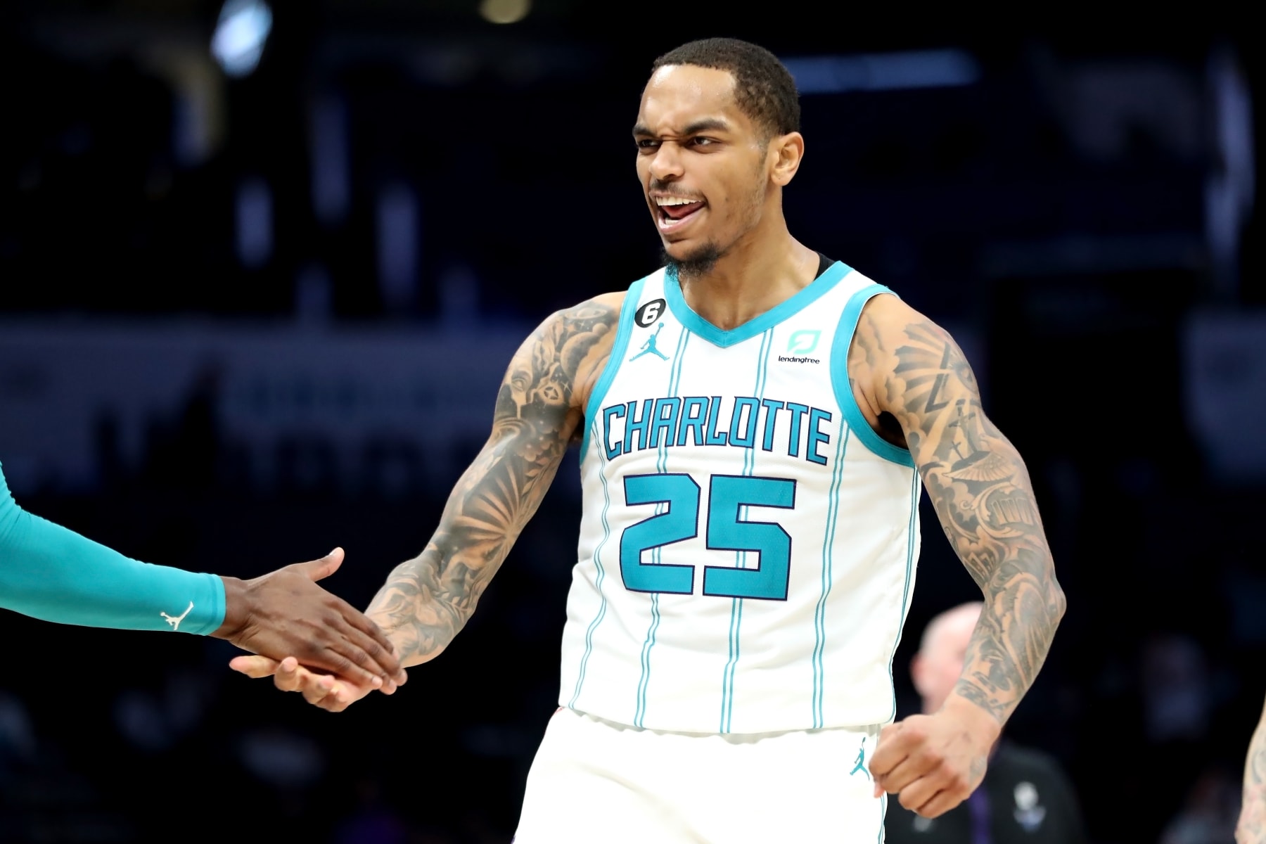 CHARLOTTE, NORTH CAROLINA - FEBRUARY 13: P.J. Washington #25 of the Charlotte Hornets celebrates after making a three pointer during the fourth period of a basketball game against the Atlanta Hawks at Spectrum Center on February 13, 2023 in Charlotte, North Carolina. NOTE TO USER: User expressly acknowledges and agrees that, by downloading and or using this photograph, User is consenting to the terms and conditions of the Getty Images License Agreement. (Photo by David Jensen/Getty Images)