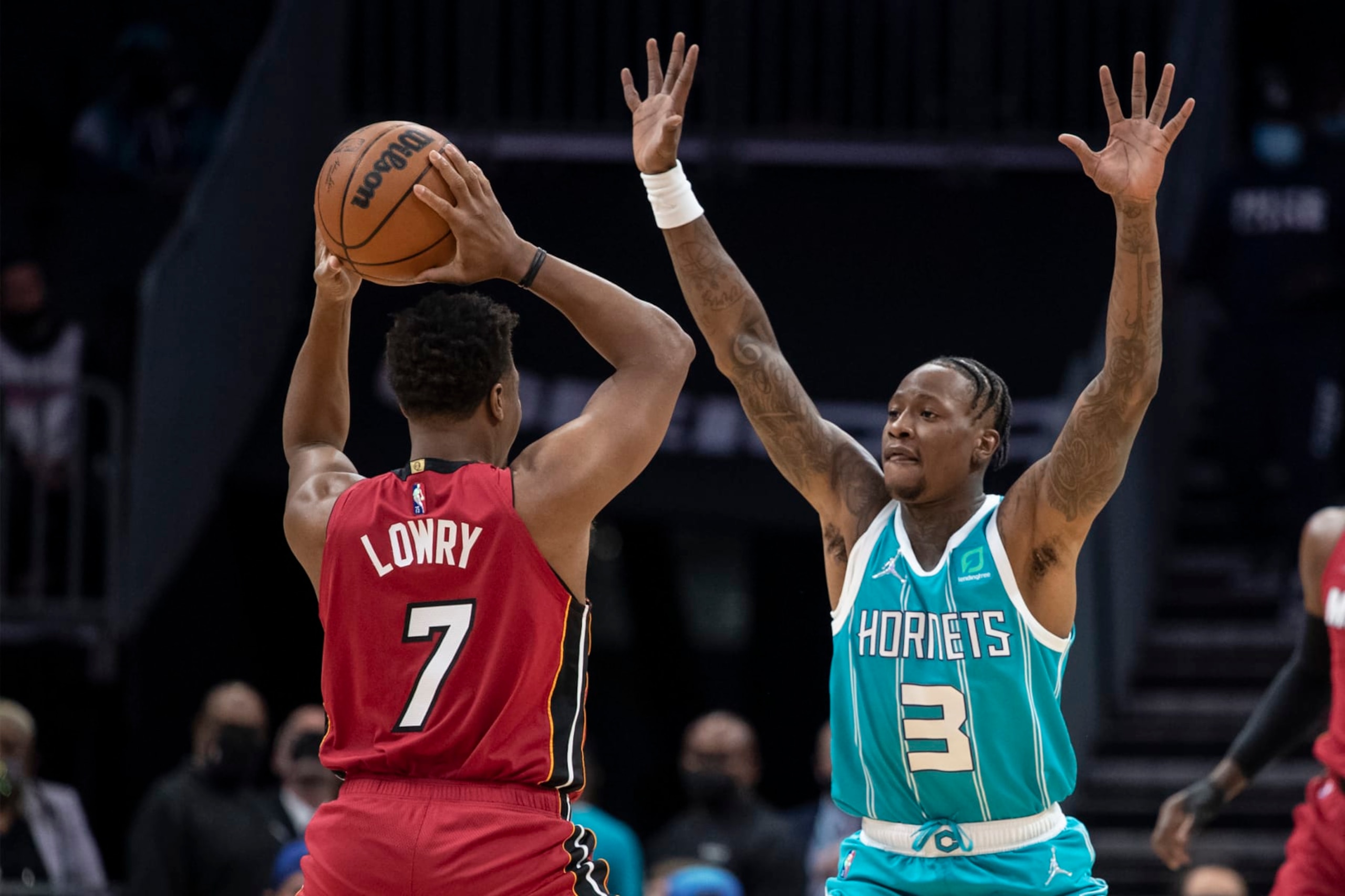 Charlotte Hornets guard Terry Rozier (3) defends against Miami Heat guard Kyle Lowry (7) during the first half of an NBA basketball game Thursday, Feb. 17, 2022, in Charlotte, N.C. (AP Photo/Matt Kelley) Charlotte Hornets guard Terry Rozier (3) defends against Miami Heat guard Kyle Lowry (7) during the first half of an NBA basketball game Thursday, Feb. 17, 2022, in Charlotte, N.C. (AP Photo/Matt Kelley)