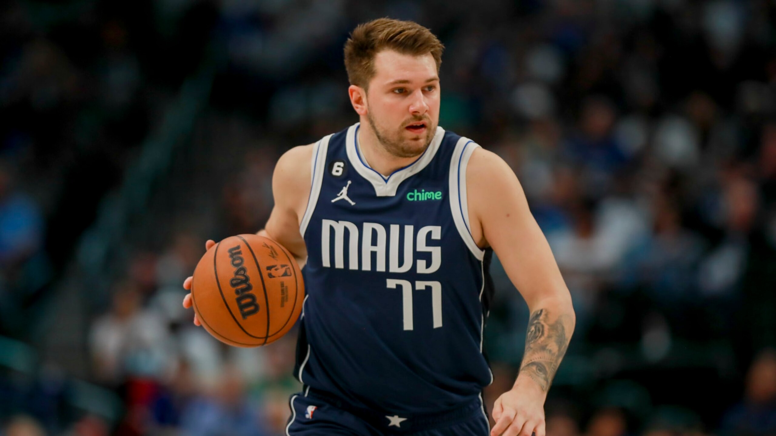 Dallas Mavericks guard Luka Doncic (77) runs the court during an NBA basketball game against the Phoenix Suns, Sunday, March 5, 2023, in Dallas. (AP Photo/Gareth Patterson)