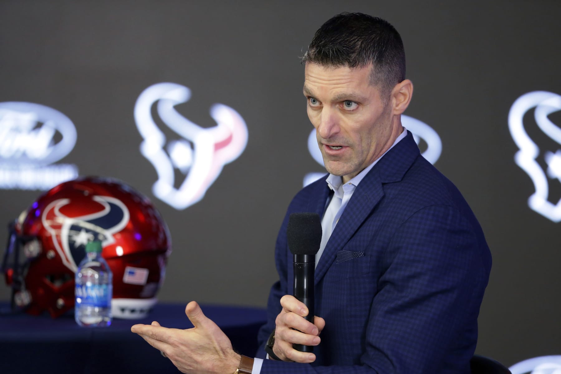 Houston Texans general manager Nick Caserio answers questions during an NFL football news conference formally announcing DeMeco Ryans as the new head coach, at NRG Stadium, Thursday, Feb. 2, 2023, in Houston. (AP Photo/Michael Wyke)