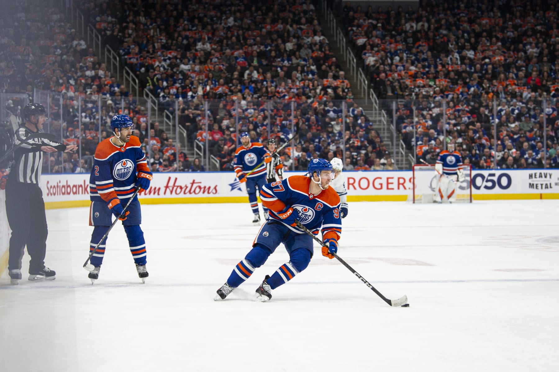 EDMONTON, ALBERTA - MARCH 01: Connor McDavid #97 of the Edmonton Oilers skates with the puck during the second period against the Toronto Maple Leafs at Rogers Place on March 01, 2023 in Edmonton, Alberta, Canada. (Photo by Paul Swanson/NHLI via Getty Images)
