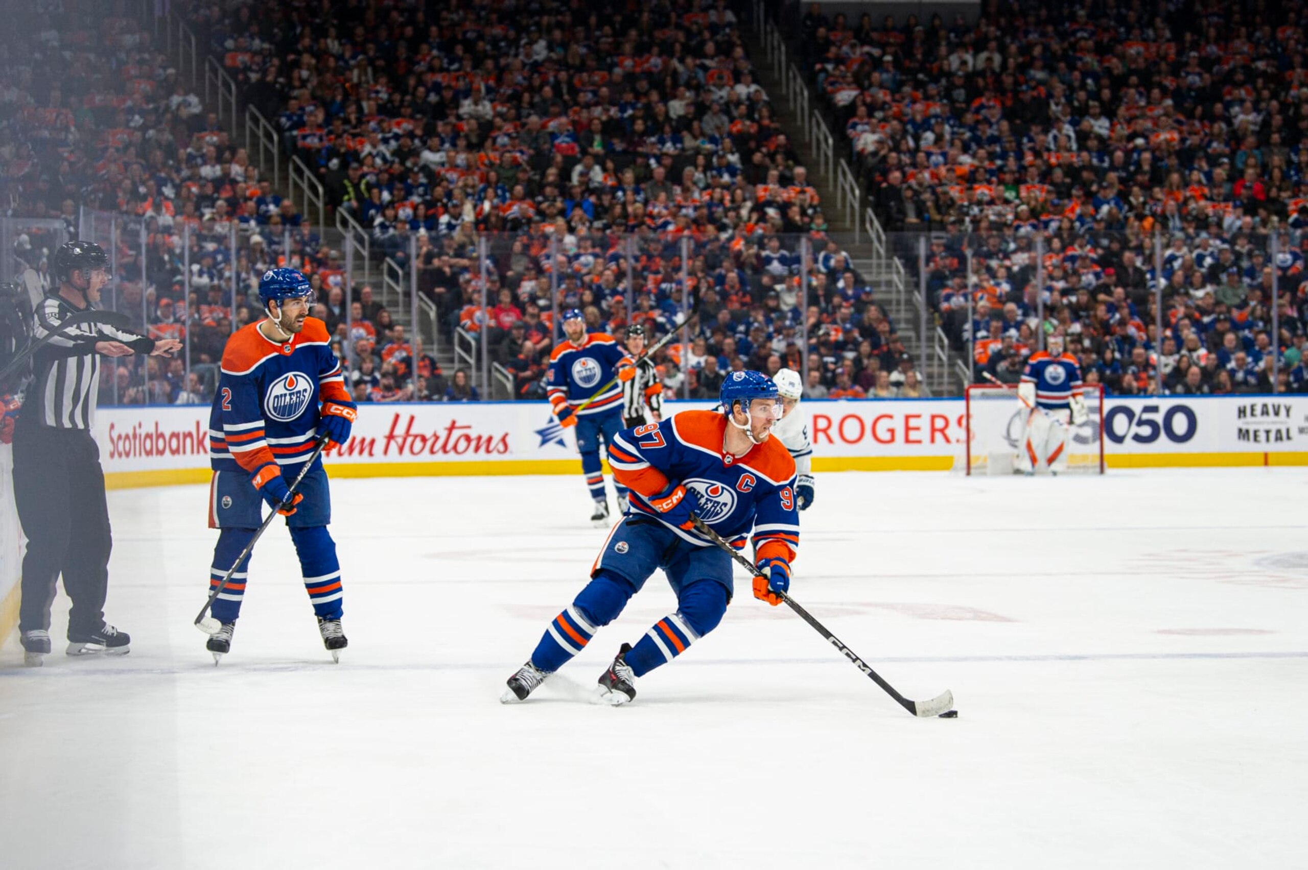 EDMONTON, ALBERTA - MARCH 01: Connor McDavid #97 of the Edmonton Oilers skates with the puck during the second period against the Toronto Maple Leafs at Rogers Place on March 01, 2023 in Edmonton, Alberta, Canada. (Photo by Paul Swanson/NHLI via Getty Images)