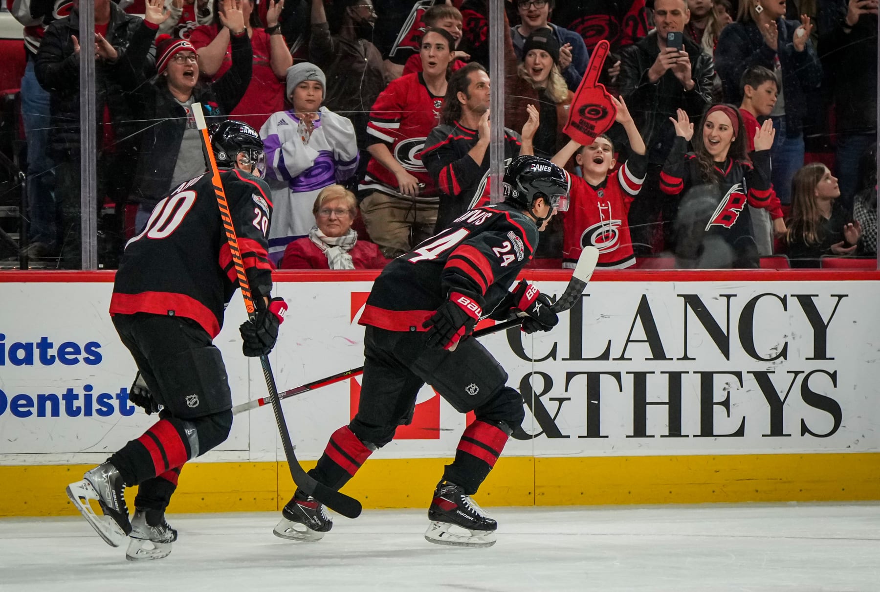 RALEIGH, NORTH CAROLINA - FEBRUARY 24: Seth Jarvis #24 of the Carolina Hurricanes celebrates with teammates after scoring a goal during the first period against the Ottawa Senators at PNC Arena on February 24, 2023 in Raleigh, North Carolina. (Photo by Josh Lavallee/NHLI via Getty Images)