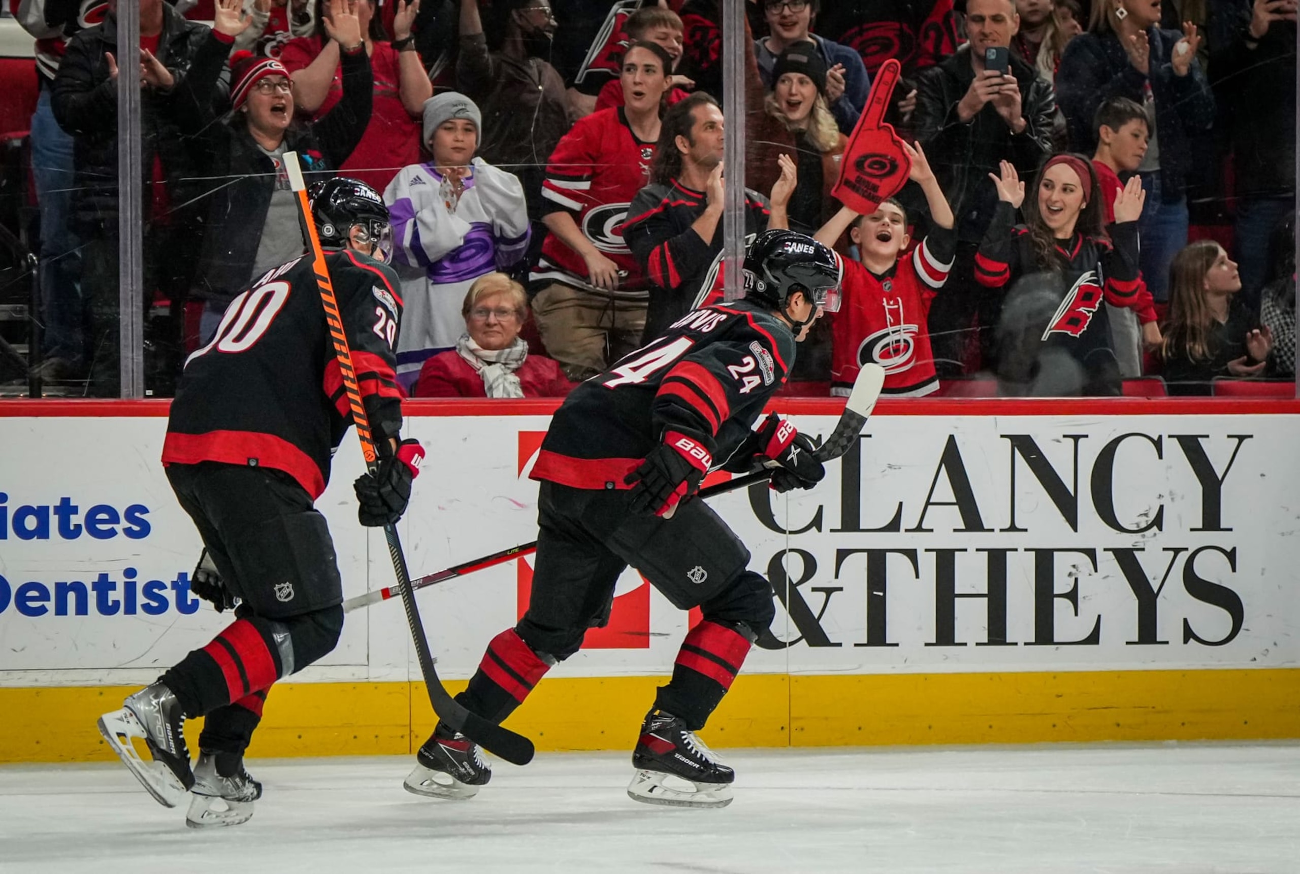 RALEIGH, NORTH CAROLINA - FEBRUARY 24: Seth Jarvis #24 of the Carolina Hurricanes celebrates with teammates after scoring a goal during the first period against the Ottawa Senators at PNC Arena on February 24, 2023 in Raleigh, North Carolina. (Photo by Josh Lavallee/NHLI via Getty Images)