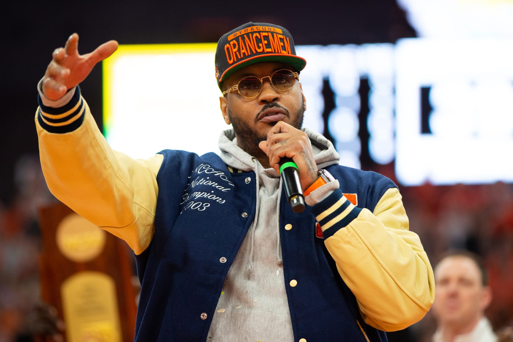 SYRACUSE, NY - MARCH 04: Carmelo Anthony speaks to the crowd during the 20th anniversary celebration of the 2003 national championship at JMA Wireless Dome on March 4, 2023 in Syracuse, New York. (Photo by Isaiah Vazquez/Getty Images)