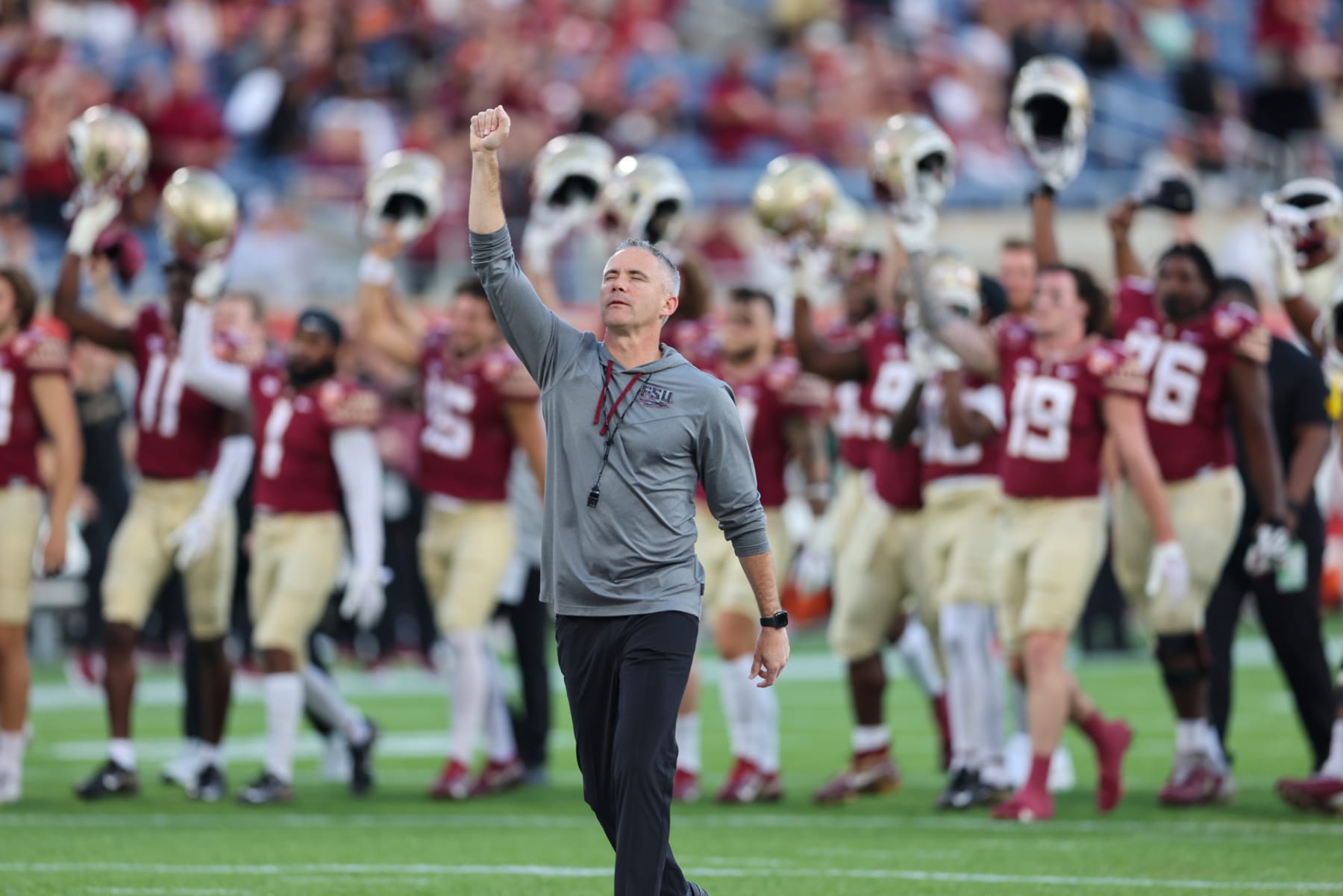 ORLANDO, FL - DECEMBER 29: Florida State Seminoles head coach Mike Norvell leads his team on the field before the Cheez-It Bowl between Oklahoma and Florida State on December 29, 2022 at Camping World Stadium, in Orlando FL. (Photo by Joe Petro/Icon Sportswire via Getty Images)