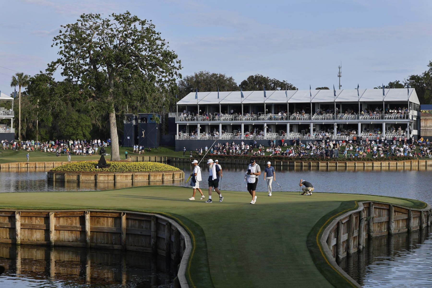 PONTE VEDRA BEACH, FL - MARCH 09: General view as players putt at the 17th hole during the first round of THE PLAYERS Championship on THE PLAYERS Stadium Course at TPC Sawgrass on March 09, 2023 in Ponte Vedra Beach, Florida. (Photo by Joe Robbins/Icon Sportswire via Getty Images)