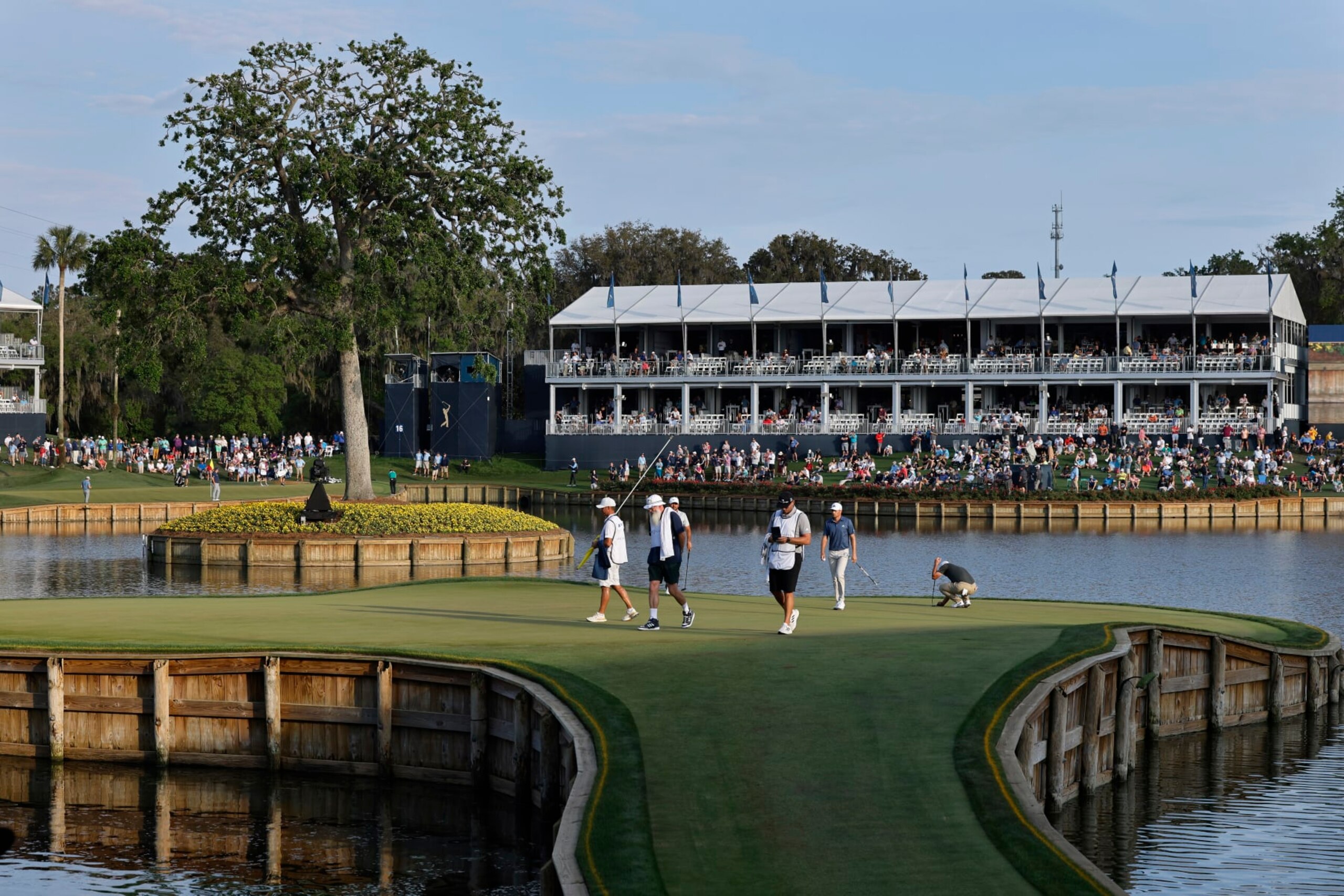 PONTE VEDRA BEACH, FL - MARCH 09: General view as players putt at the 17th hole during the first round of THE PLAYERS Championship on THE PLAYERS Stadium Course at TPC Sawgrass on March 09, 2023 in Ponte Vedra Beach, Florida. (Photo by Joe Robbins/Icon Sportswire via Getty Images)
