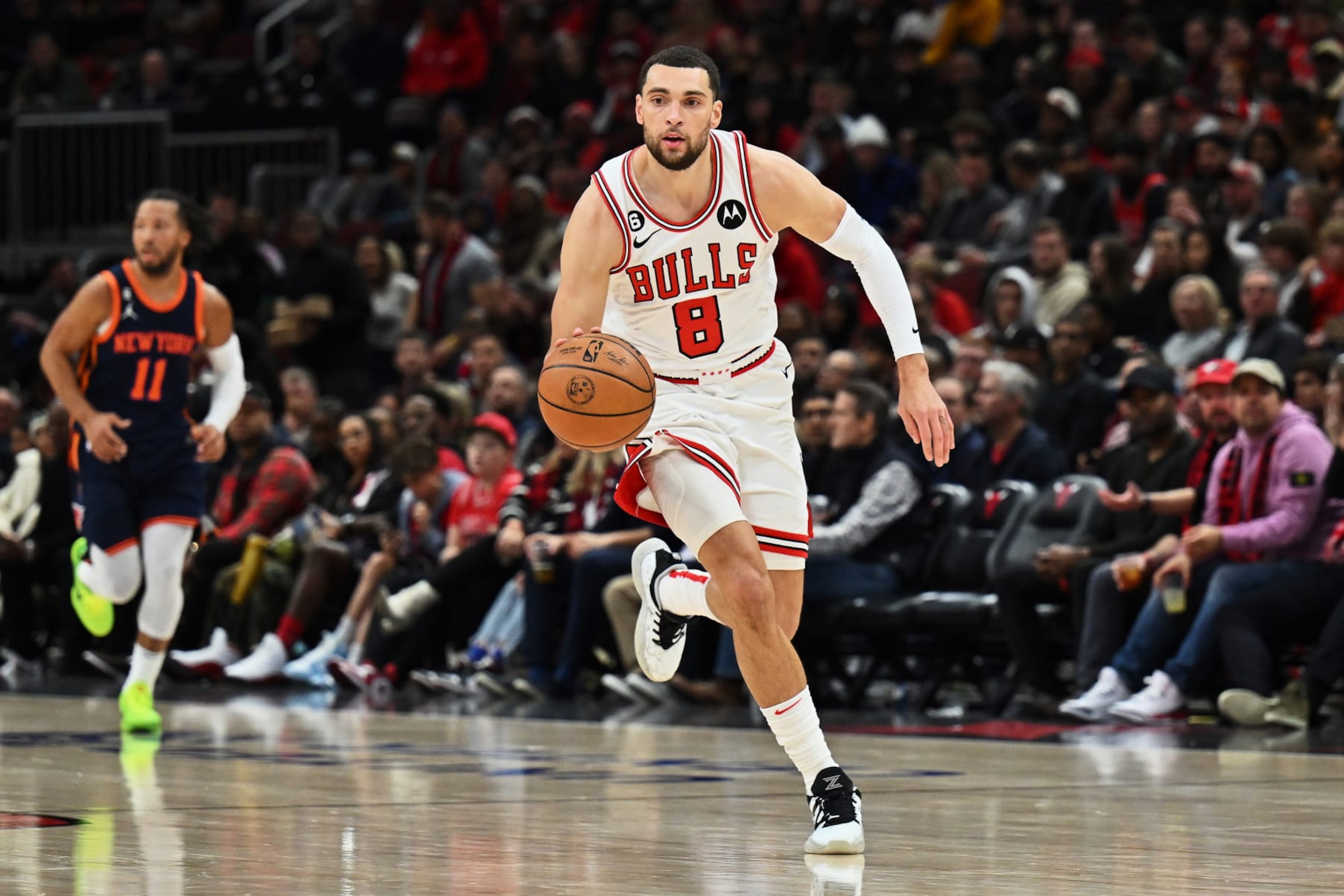 CHICAGO, ILLINOIS - DECEMBER 16:  Zach Lavine #8 of the Chicago Bulls controls the ball against the New York Knicks on December 16, 2022 at the United Center in Chicago, Illinois. New York defeated Chicago 114-91.  NOTE TO USER: User expressly acknowledges and agrees that, by downloading and or using this photograph, User is consenting to the terms and conditions of the Getty Images License Agreement.  (Photo by Jamie Sabau/Getty Images)