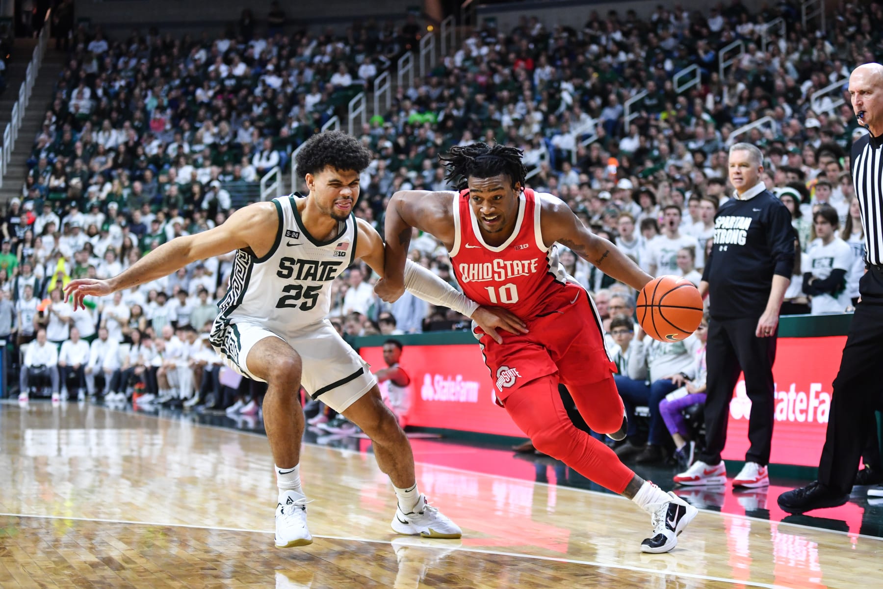 Ohio State's Brice Sensabaugh dribbles past Michigan State's Malik Hall
