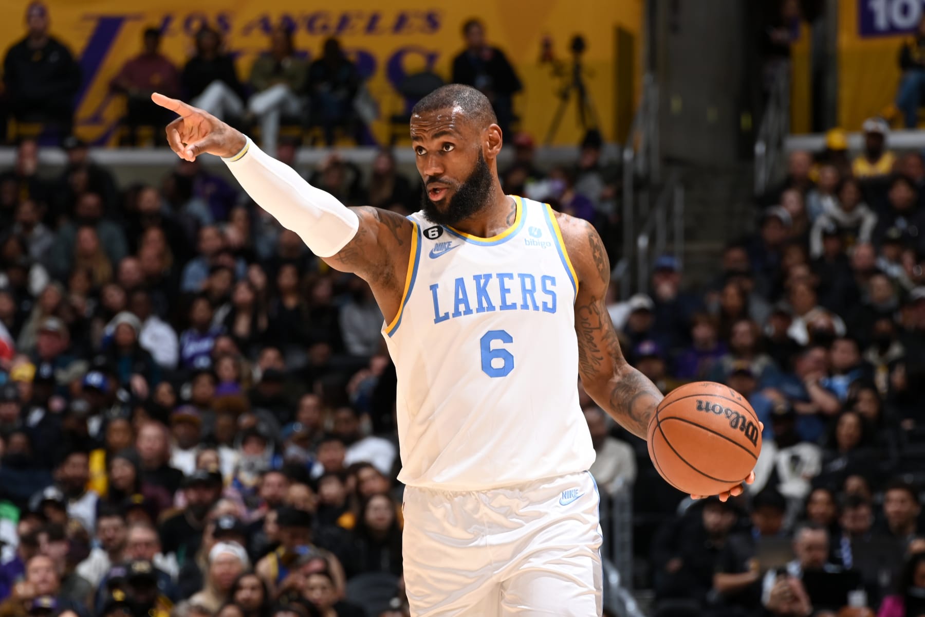 LOS ANGELES, CA - FEBRUARY 23: LeBron James #6 of the Los Angeles Lakers looks on during the game against the Golden State Warriors on February 23, 2023 at Crypto.Com Arena in Los Angeles, California. NOTE TO USER: User expressly acknowledges and agrees that, by downloading and/or using this Photograph, user is consenting to the terms and conditions of the Getty Images License Agreement. Mandatory Copyright Notice: Copyright 2023 NBAE (Photo by Andrew D. Bernstein/NBAE via Getty Images)
