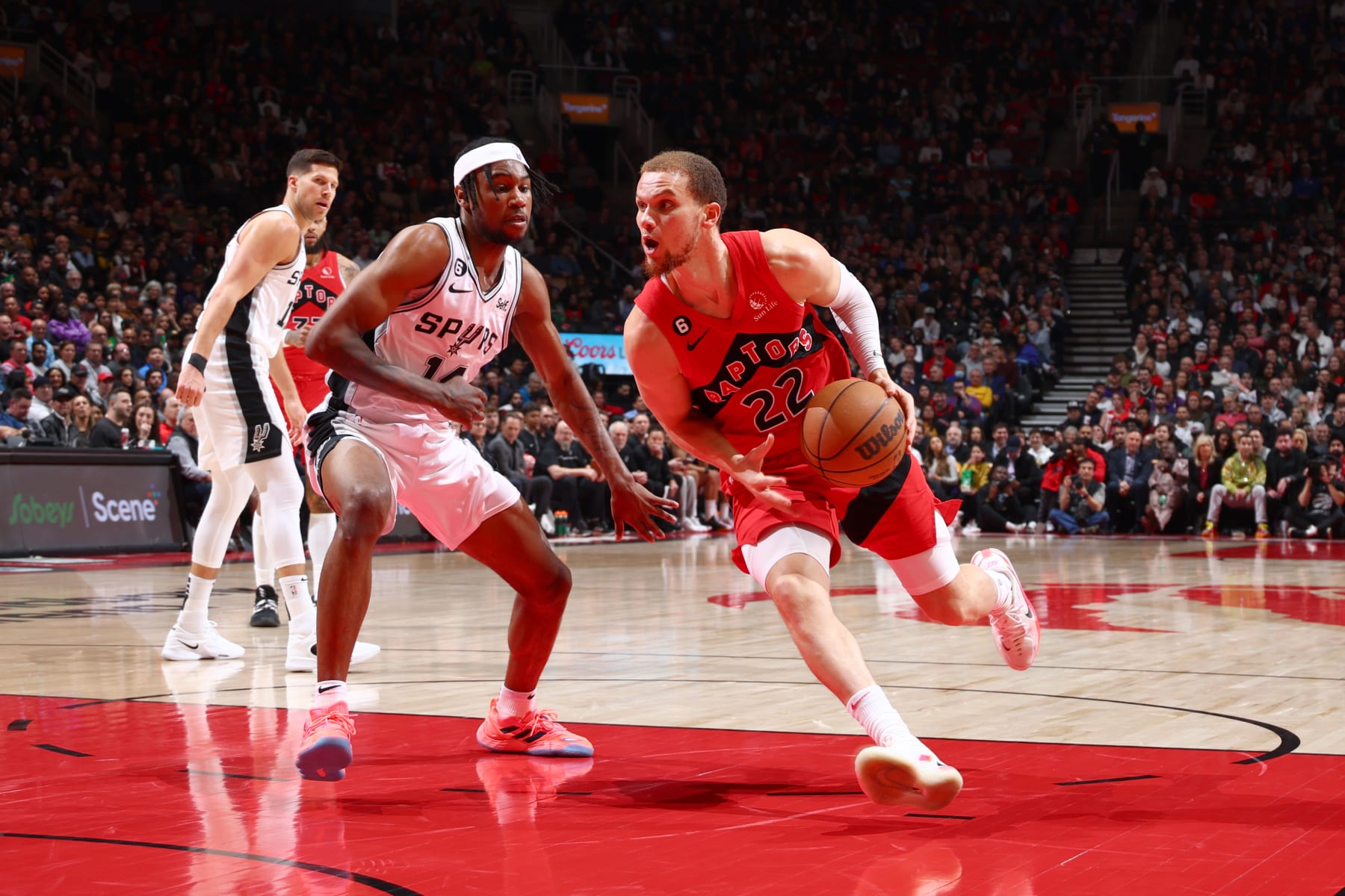 TORONTO, CANADA - FEBRUARY 8: Malachi Flynn #22 of the Toronto Raptors drives to the basket during the game against the San Antonio Spurs on February 8, 2023 at the Scotiabank Arena in Toronto, Ontario, Canada.  NOTE TO USER: User expressly acknowledges and agrees that, by downloading and or using this Photograph, user is consenting to the terms and conditions of the Getty Images License Agreement.  Mandatory Copyright Notice: Copyright 2023 NBAE (Photo by Vaughn Ridley/NBAE via Getty Images)