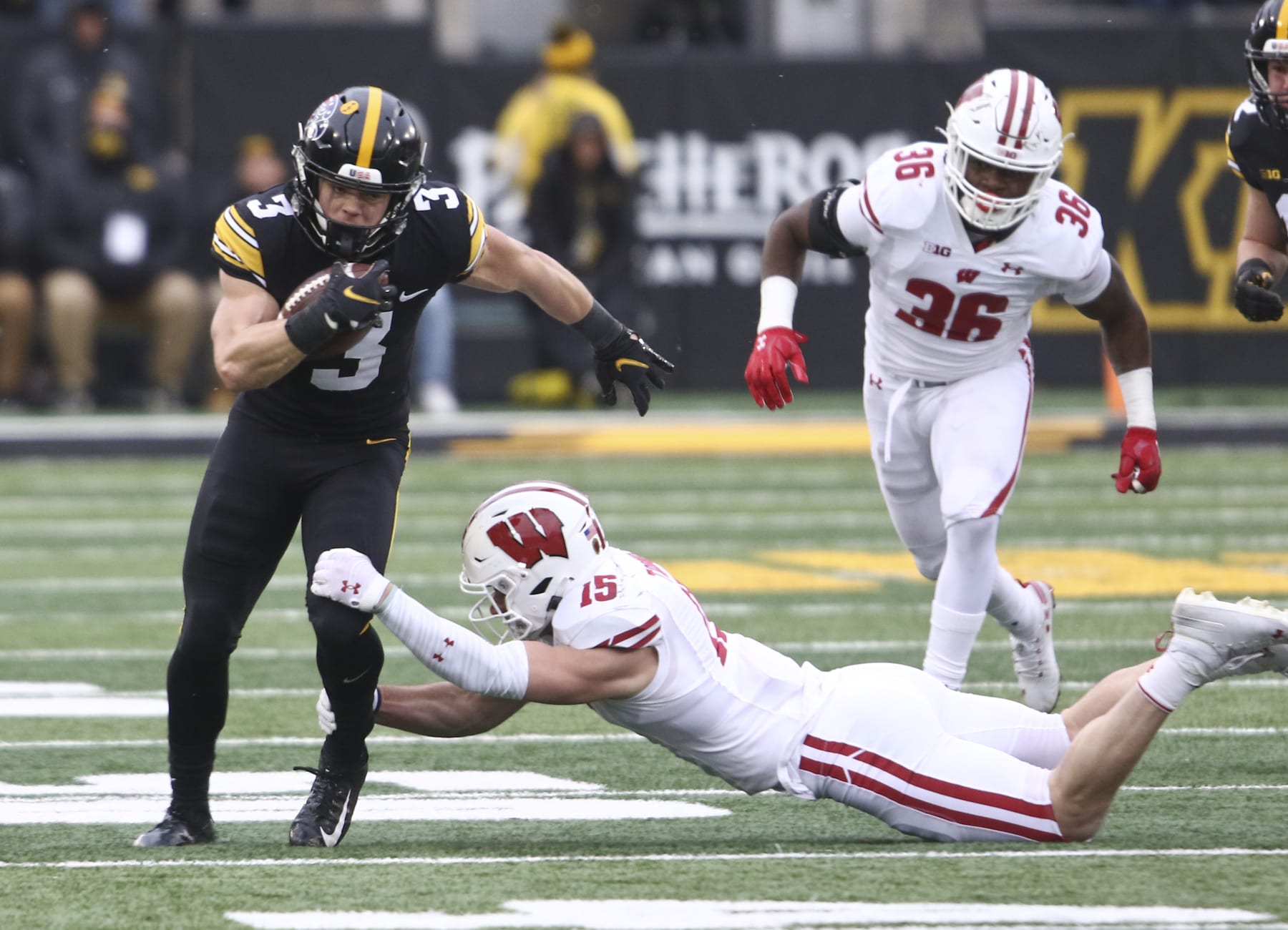 IOWA CITY, IOWA - NOVEMBER 12:  Defensive back Cooper DeJean #3 of the Iowa Hawkeyes runs up the field during the first half against safety John Torchio #15 of the Wisconsin Badgers at Kinnick Stadium, on November 12, 2022 in Iowa City, Iowa.  (Photo by Matthew Holst/Getty Images)