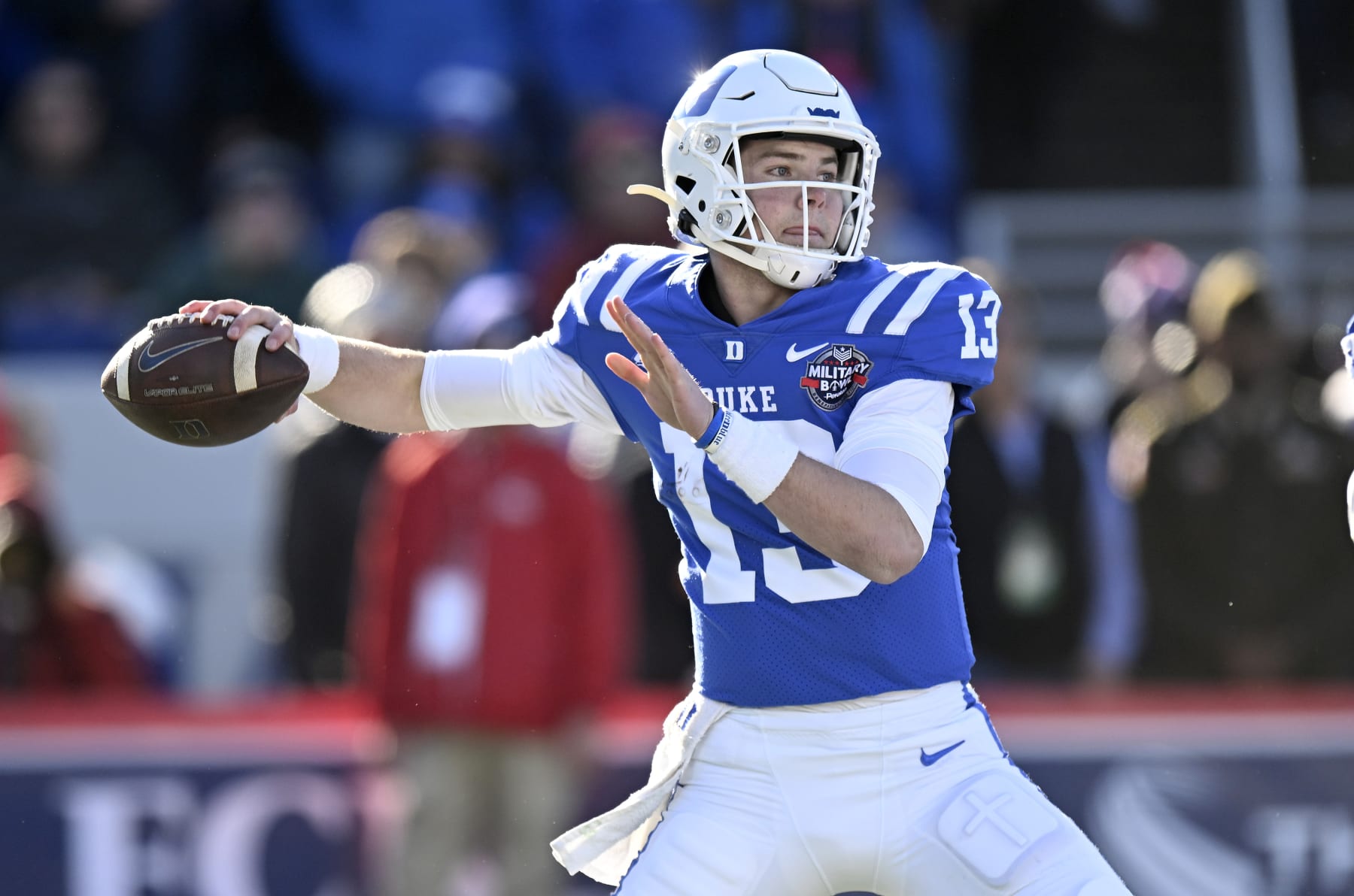 ANNAPOLIS, MARYLAND - DECEMBER 28: Riley Leonard #13 of the Duke Blue Devils throws a pass in the first quarter against the UCF Knights in the Military Bowl Presented by Peraton at Navy-Marine Corps Memorial Stadium on December 28, 2022 in Annapolis, Maryland. (Photo by Greg Fiume/Getty Images)