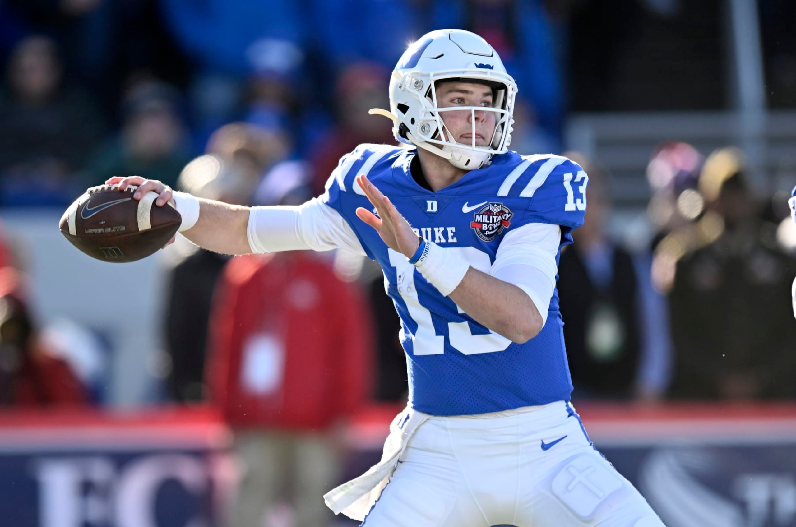 ANNAPOLIS, MARYLAND - DECEMBER 28: Riley Leonard #13 of the Duke Blue Devils throws a pass in the first quarter against the UCF Knights in the Military Bowl Presented by Peraton at Navy-Marine Corps Memorial Stadium on December 28, 2022 in Annapolis, Maryland. (Photo by Greg Fiume/Getty Images) ANNAPOLIS, MARYLAND - DECEMBER 28: Riley Leonard #13 of the Duke Blue Devils throws a pass in the first quarter against the UCF Knights in the Military Bowl Presented by Peraton at Navy-Marine Corps Memorial Stadium on December 28, 2022 in Annapolis, Maryland. (Photo by Greg Fiume/Getty Images)