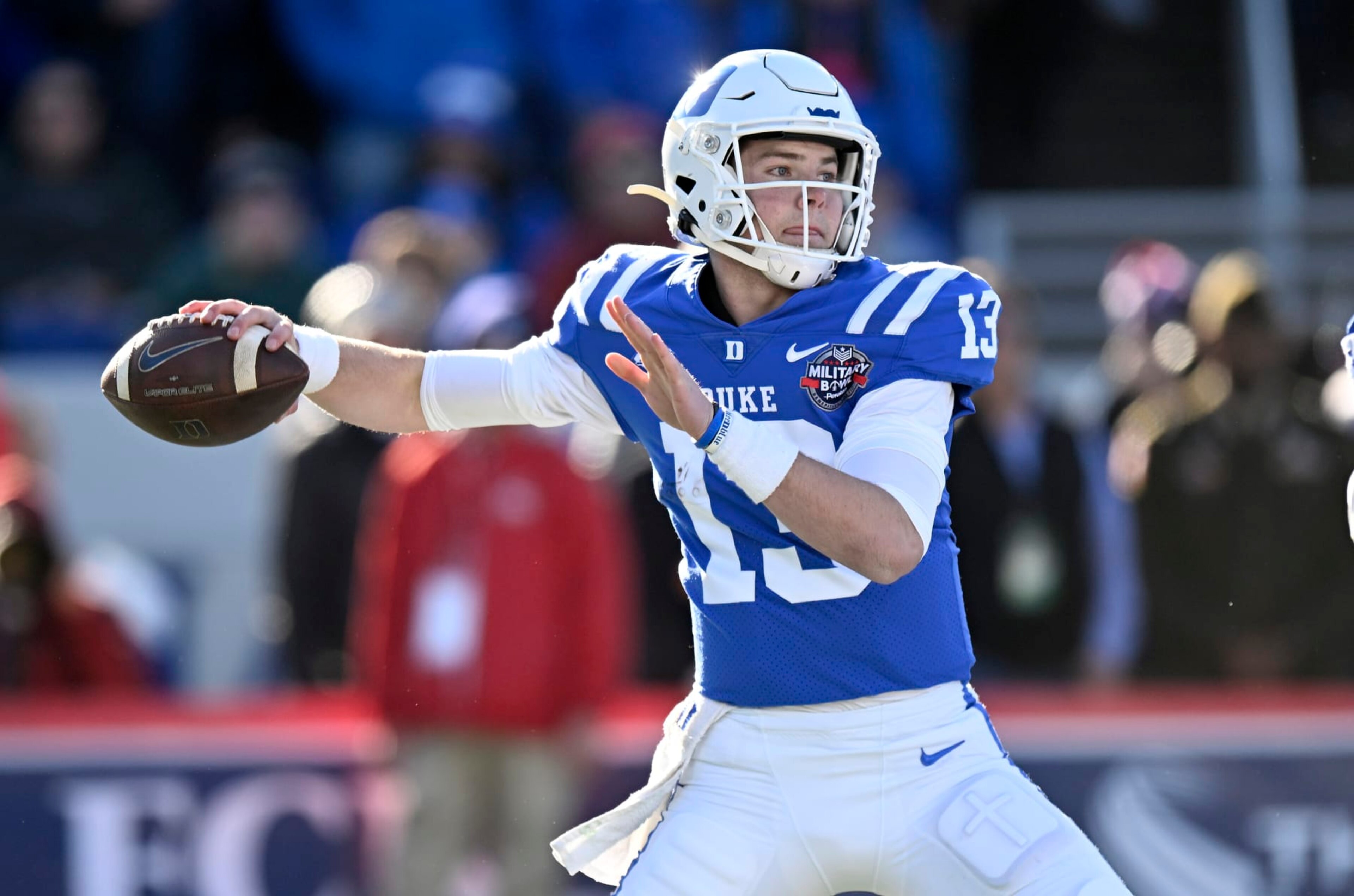 ANNAPOLIS, MARYLAND - DECEMBER 28: Riley Leonard #13 of the Duke Blue Devils throws a pass in the first quarter against the UCF Knights in the Military Bowl Presented by Peraton at Navy-Marine Corps Memorial Stadium on December 28, 2022 in Annapolis, Maryland. (Photo by Greg Fiume/Getty Images)