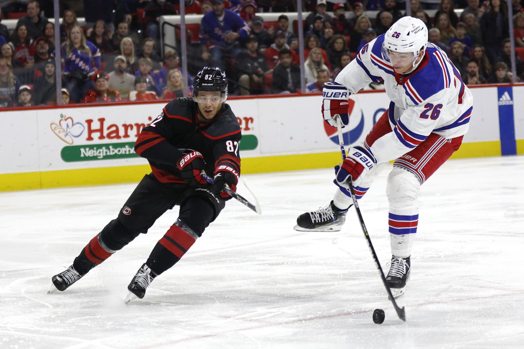 RALEIGH, NORTH CAROLINA - FEBRUARY 11: Jimmy Vesey #26 of the New York Rangers attempts a shot during the third period of the game against the Carolina Hurricanes at PNC Arena on February 11, 2023 in Raleigh, North Carolina. (Photo by Jared C. Tilton/Getty Images)
