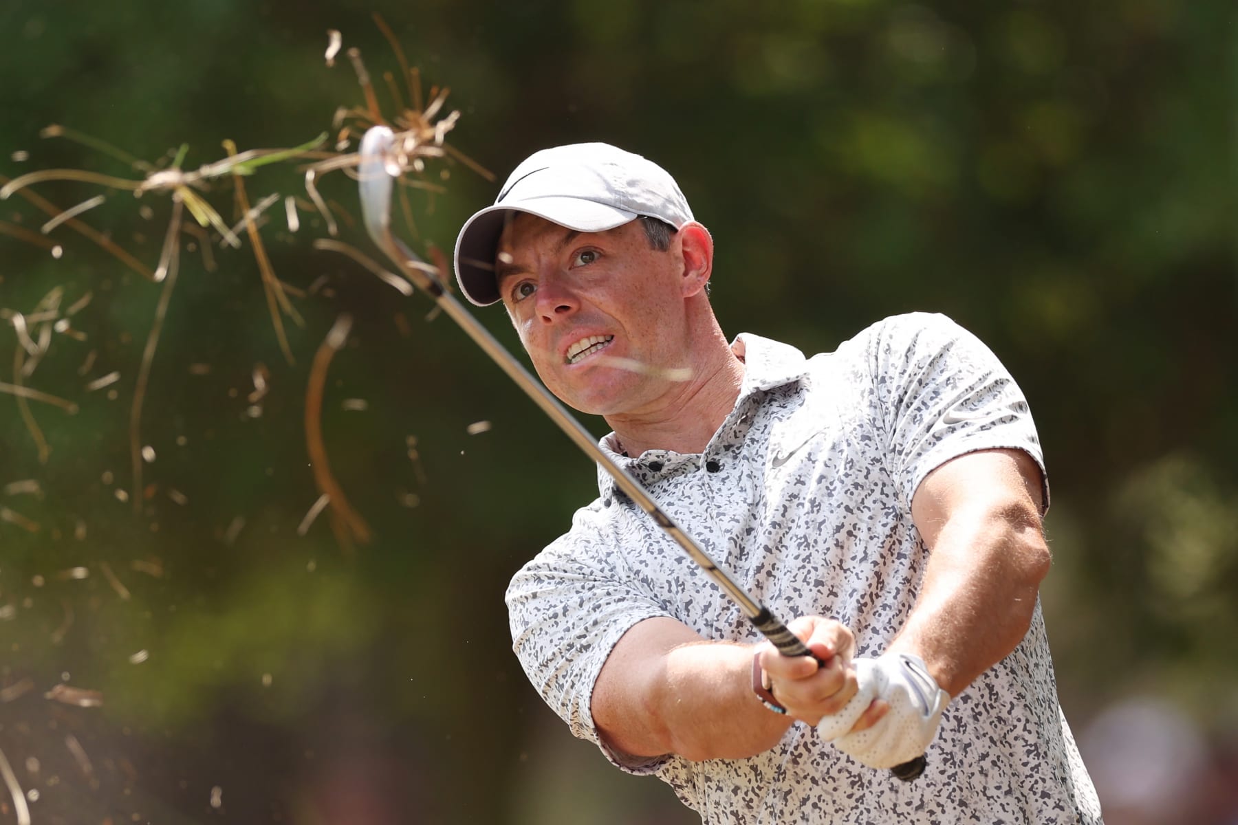 PONTE VEDRA BEACH, FLORIDA - MARCH 10: Rory McIlroy of Northern Ireland plays a second shot on the first hole during the second round of THE PLAYERS Championship on THE PLAYERS Stadium Course at TPC Sawgrass on March 10, 2023 in Ponte Vedra Beach, Florida. (Photo by Richard Heathcote/Getty Images)