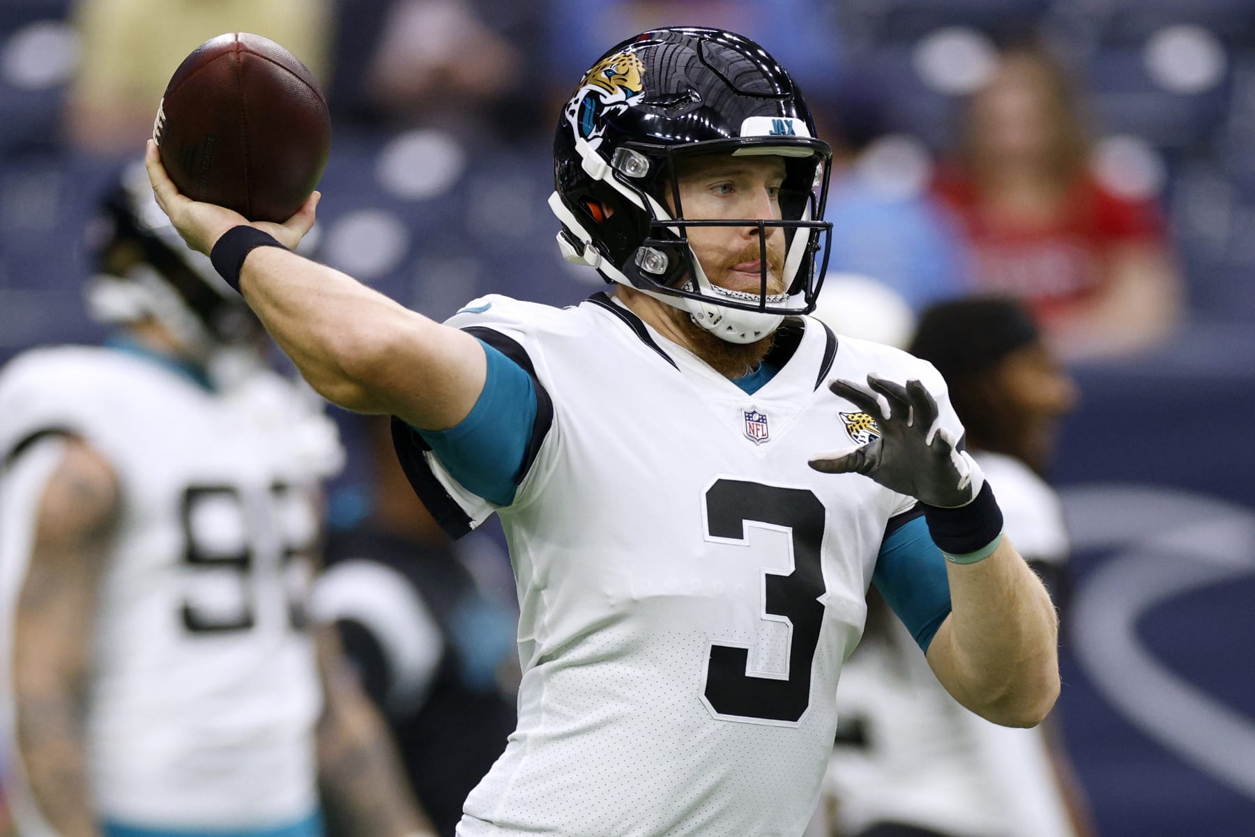 HOUSTON, TEXAS - JANUARY 01: C.J. Beathard #3 of the Jacksonville Jaguars warms up prior to a game against the Houston Texans at NRG Stadium on January 01, 2023 in Houston, Texas. (Photo by Tim Warner/Getty Images)