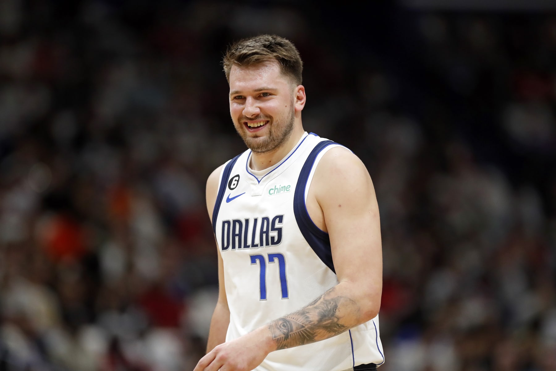 Dallas Mavericks guard Luka Doncic (77) reacts to a call in the first half of an NBA basketball game against the New Orleans Pelicans in New Orleans, Wednesday, March 8, 2023. (AP Photo/Tyler Kaufman)