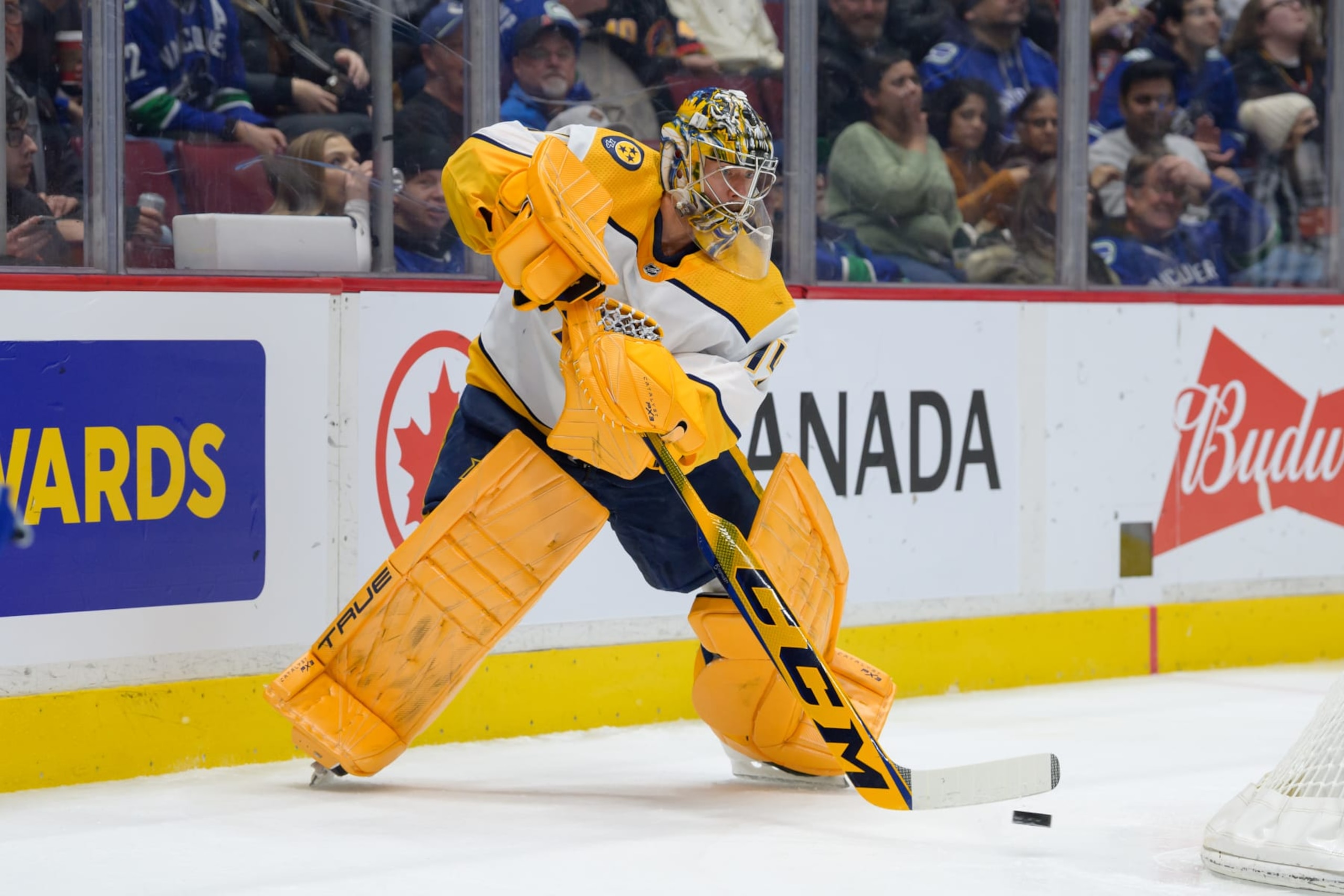 VANCOUVER, CANADA - MARCH 6: Juuse Saros #74 of the Nashville Predators plays the puck during the first period of their NHL game against the Vancouver Canucks at Rogers Arena on March 6, 2023 in Vancouver, British Columbia, Canada. (Photo by Derek Cain/Getty Images)