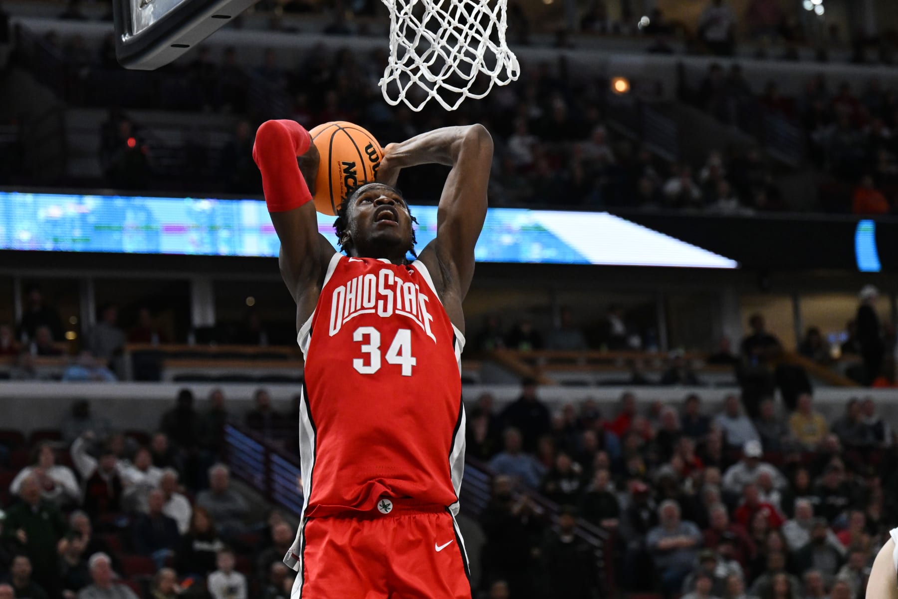 CHICAGO, ILLINOIS - MARCH 10: Felix Okpara #34 of the Ohio State Buckeyes dunks Michigan State Spartans during the second half in the quarterfinals of the Big Ten Tournament at United Center on March 10, 2023 in Chicago, Illinois. (Photo by Quinn Harris/Getty Images)