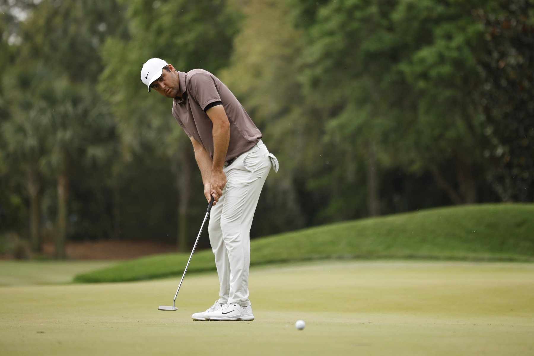 PONTE VEDRA BEACH, FLORIDA - MARCH 10: Scottie Scheffler of the United States putts on the tenth green during the second round of THE PLAYERS Championship on THE PLAYERS Stadium Course at TPC Sawgrass on March 10, 2023 in Ponte Vedra Beach, Florida. (Photo by Jared C. Tilton/Getty Images)