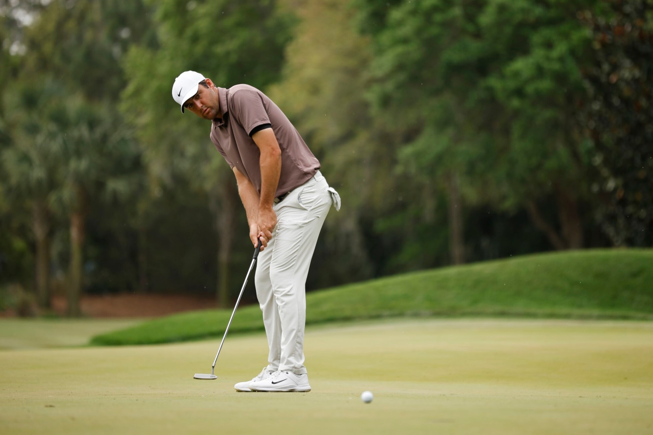 PONTE VEDRA BEACH, FLORIDA - MARCH 10: Scottie Scheffler of the United States putts on the tenth green during the second round of THE PLAYERS Championship on THE PLAYERS Stadium Course at TPC Sawgrass on March 10, 2023 in Ponte Vedra Beach, Florida. (Photo by Jared C. Tilton/Getty Images)