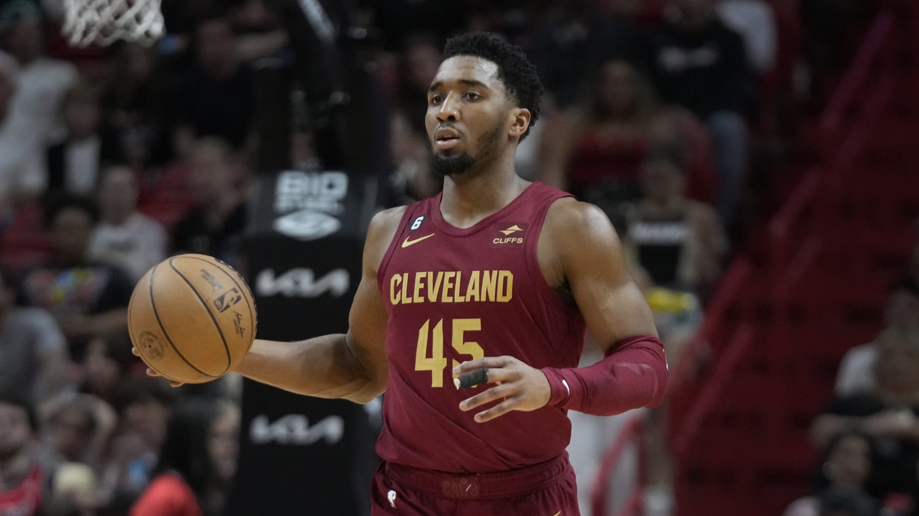 Cleveland Cavaliers guard Donovan Mitchell takes the ball down the court during the first half of an NBA basketball game against the Miami Heat, Wednesday, March 8, 2023, in Miami. (AP Photo/Wilfredo Lee)