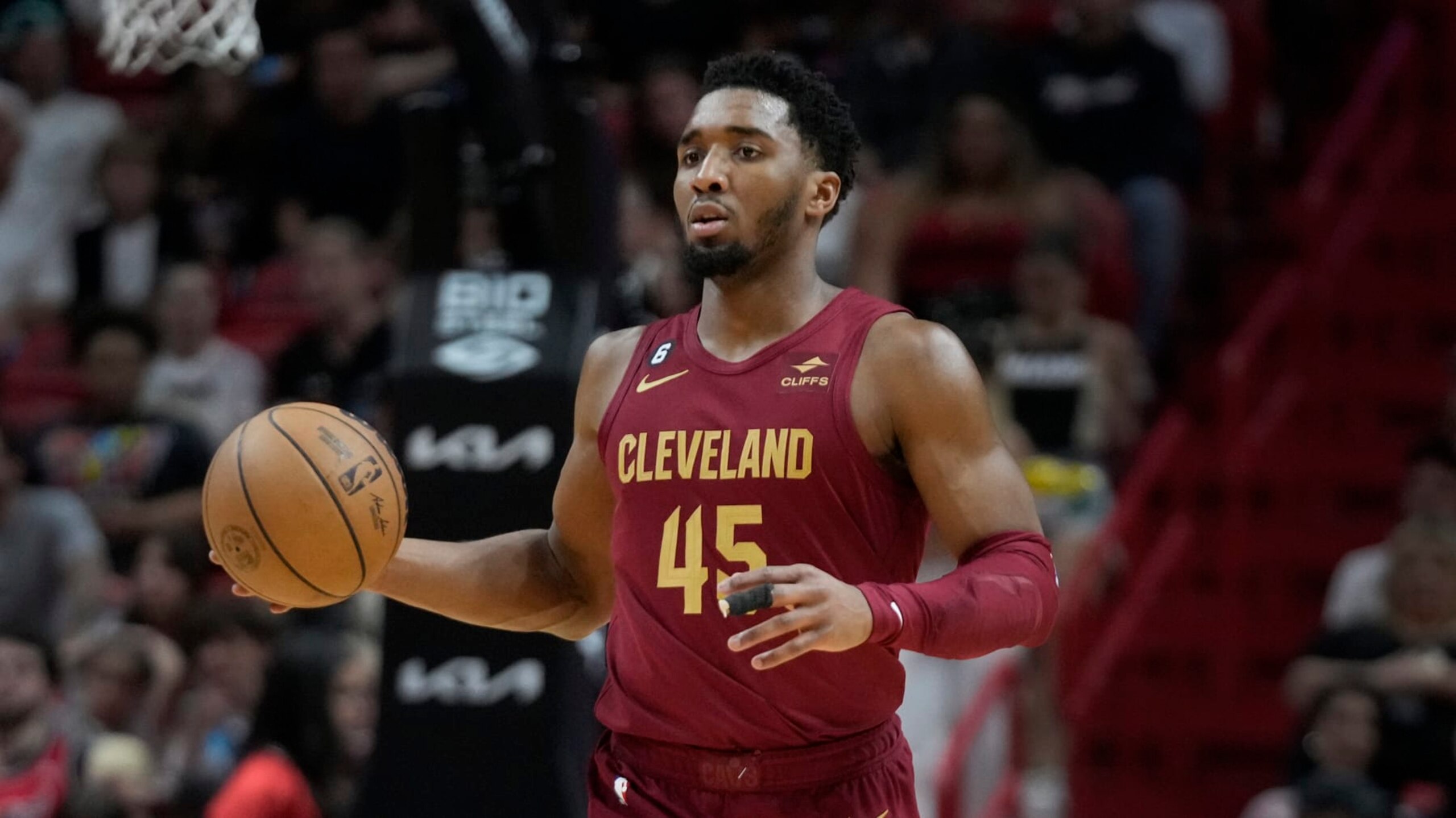 Cleveland Cavaliers guard Donovan Mitchell takes the ball down the court during the first half of an NBA basketball game against the Miami Heat, Wednesday, March 8, 2023, in Miami. (AP Photo/Wilfredo Lee)