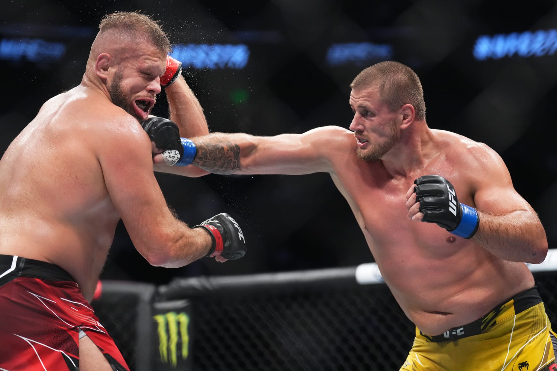 Alexandr Romanov (right) will fight in the co-main event.